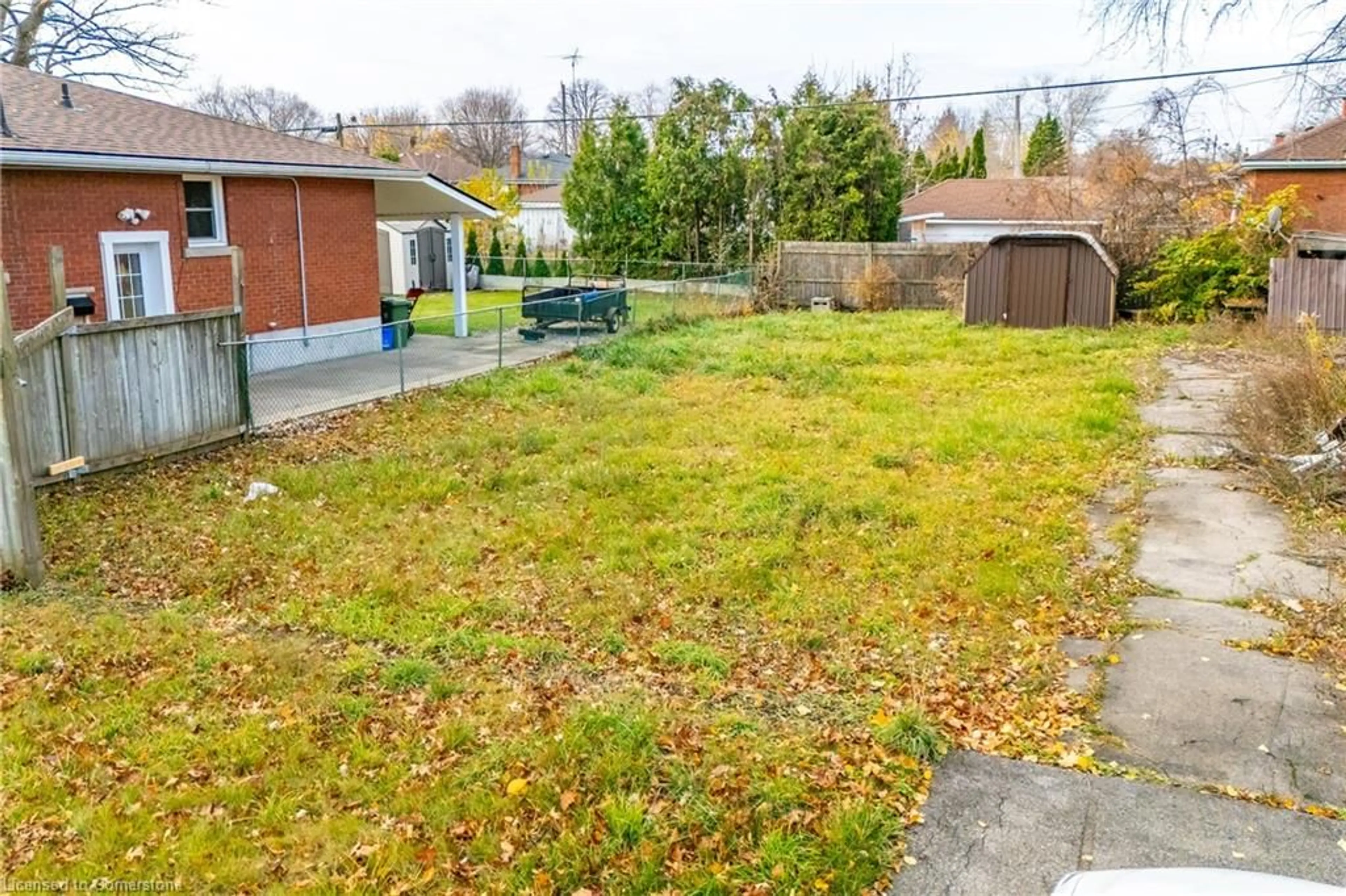 Patio, the fenced backyard for 270 East 43rd St, Hamilton Ontario L8T 3E1