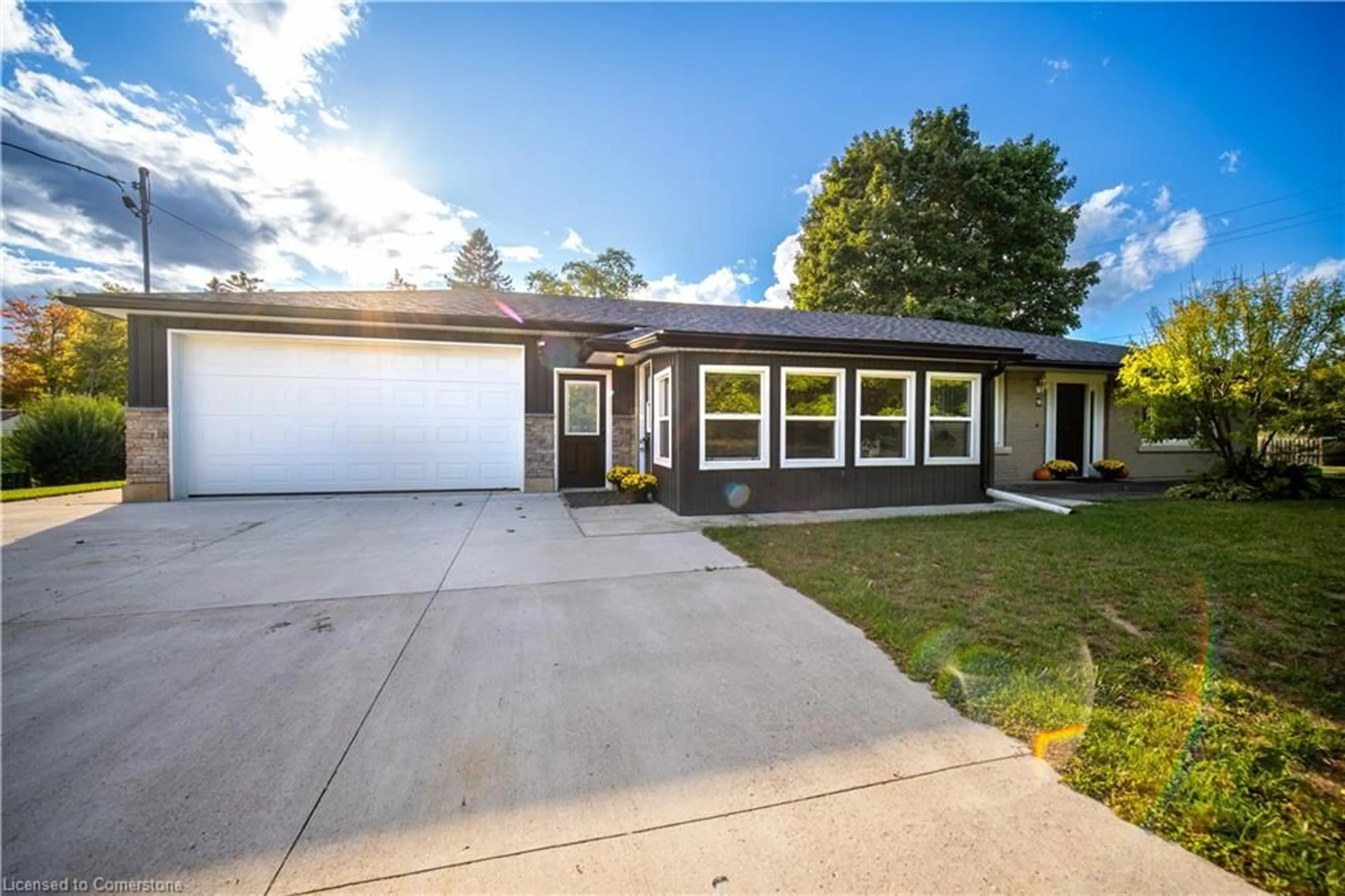 Frontside or backside of a home, the street view for 9 Maple Ave, Burford Ontario N0E 1A0