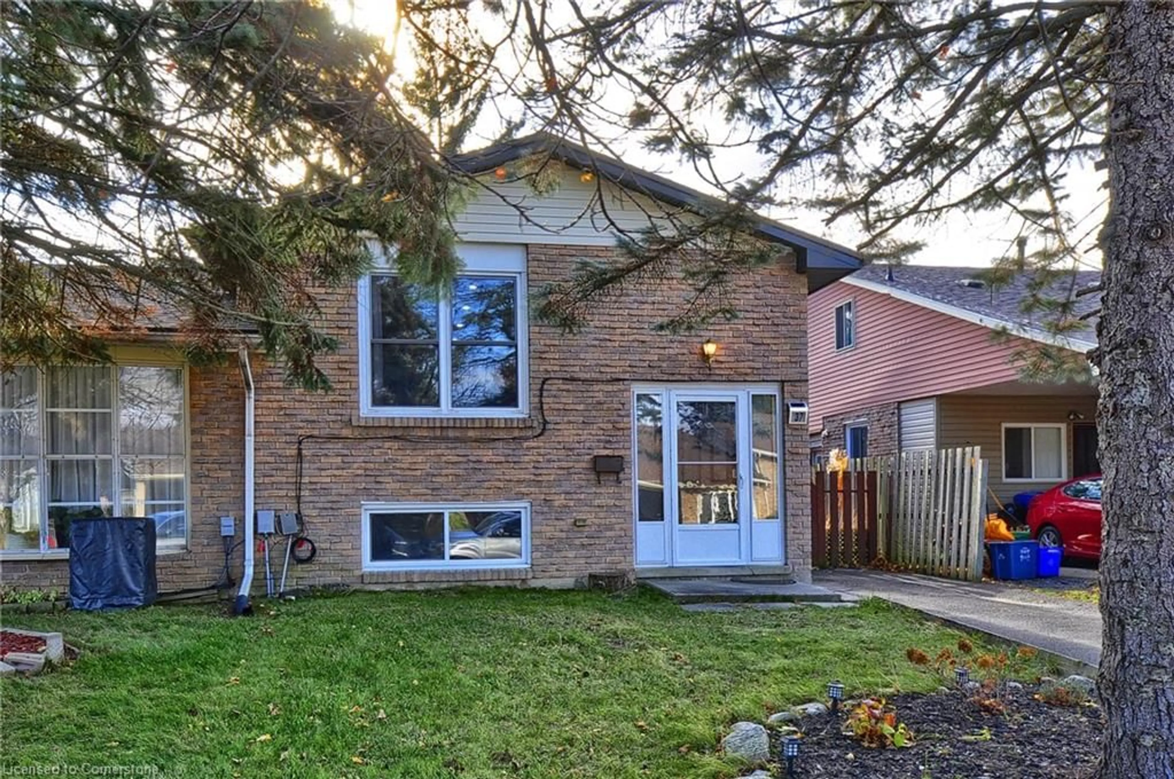 A pic from exterior of the house or condo, the fenced backyard for 37 Autumn Rd, Brantford Ontario N3R 7B1