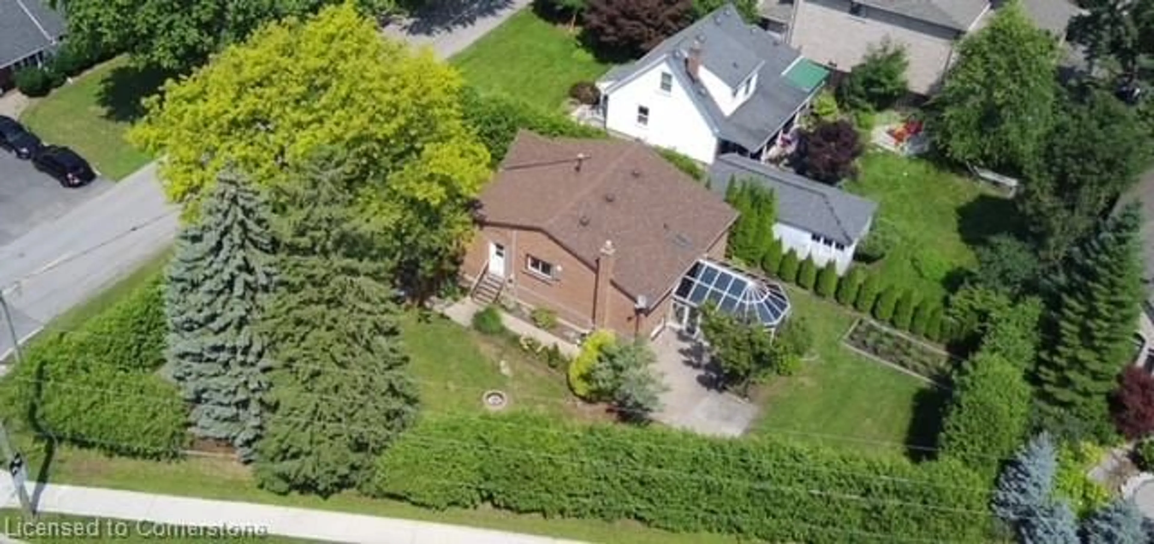 Frontside or backside of a home, the fenced backyard for 179 Orchard Dr, Ancaster Ontario L9G 1Z8