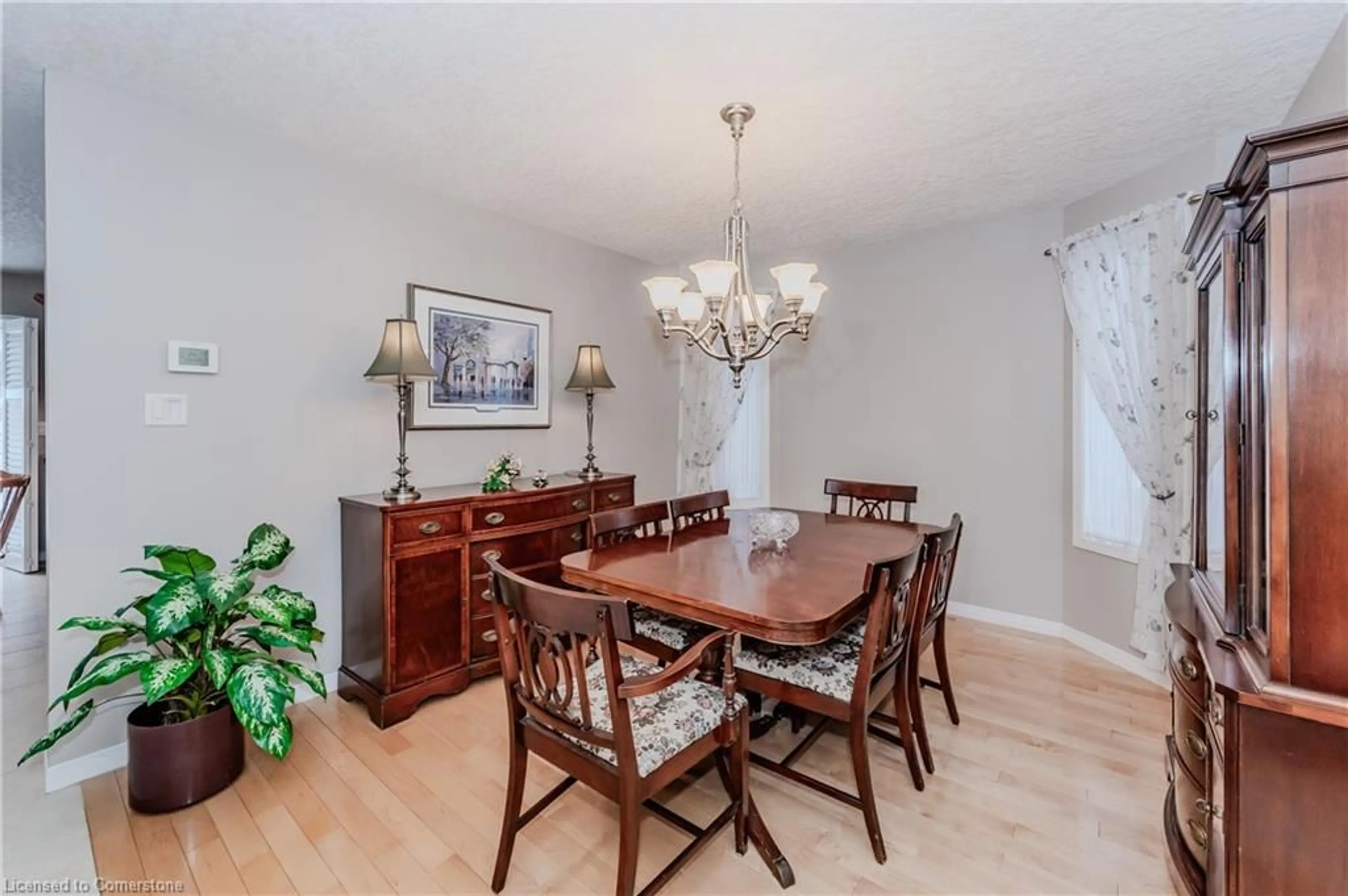 Dining room, wood/laminate floor for 425 Pastern Trail, Waterloo Ontario N2K 4K6