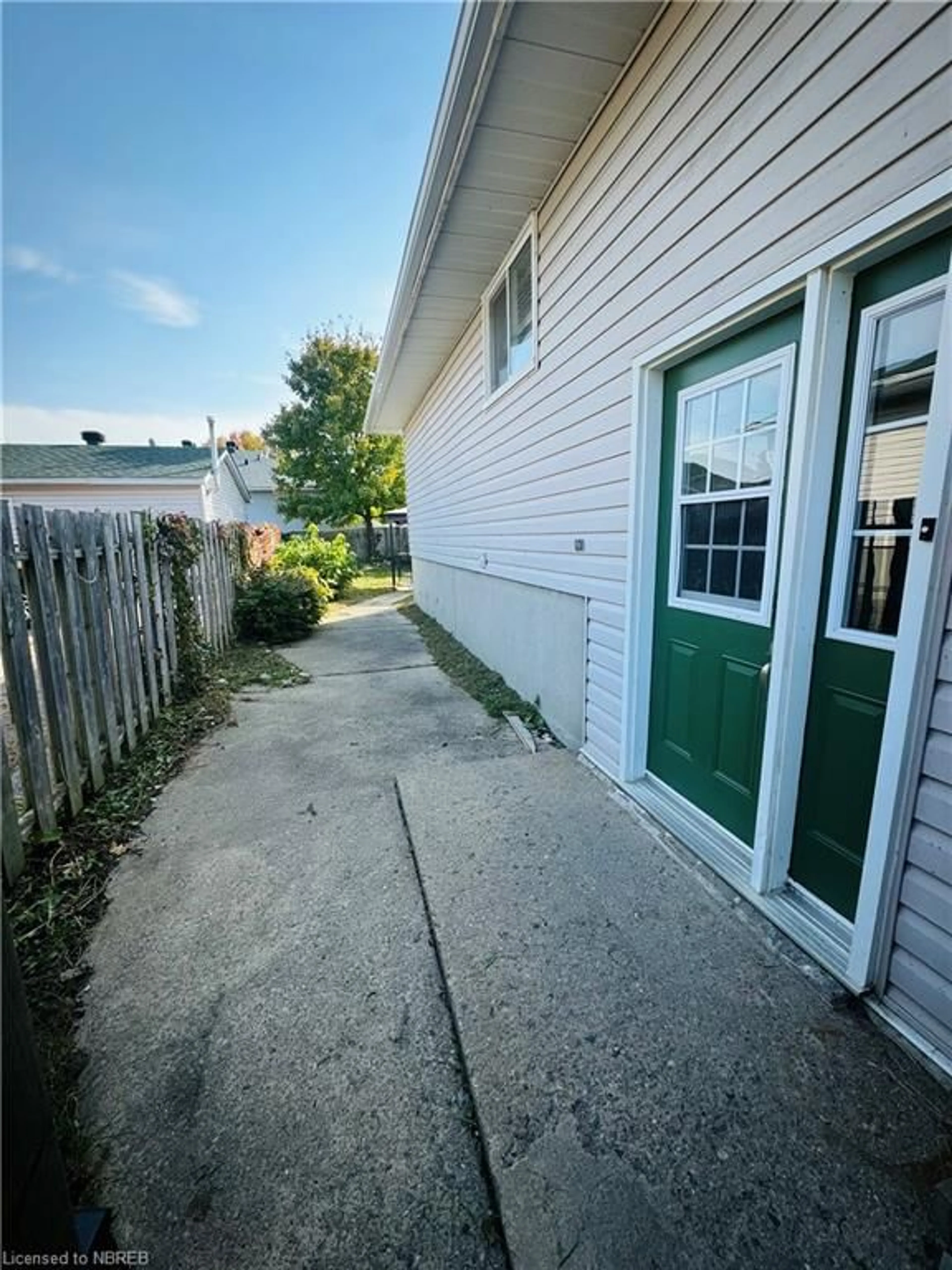 A pic from exterior of the house or condo, the fenced backyard for 49 Beaver Cres, North Bay Ontario P1A 3N1