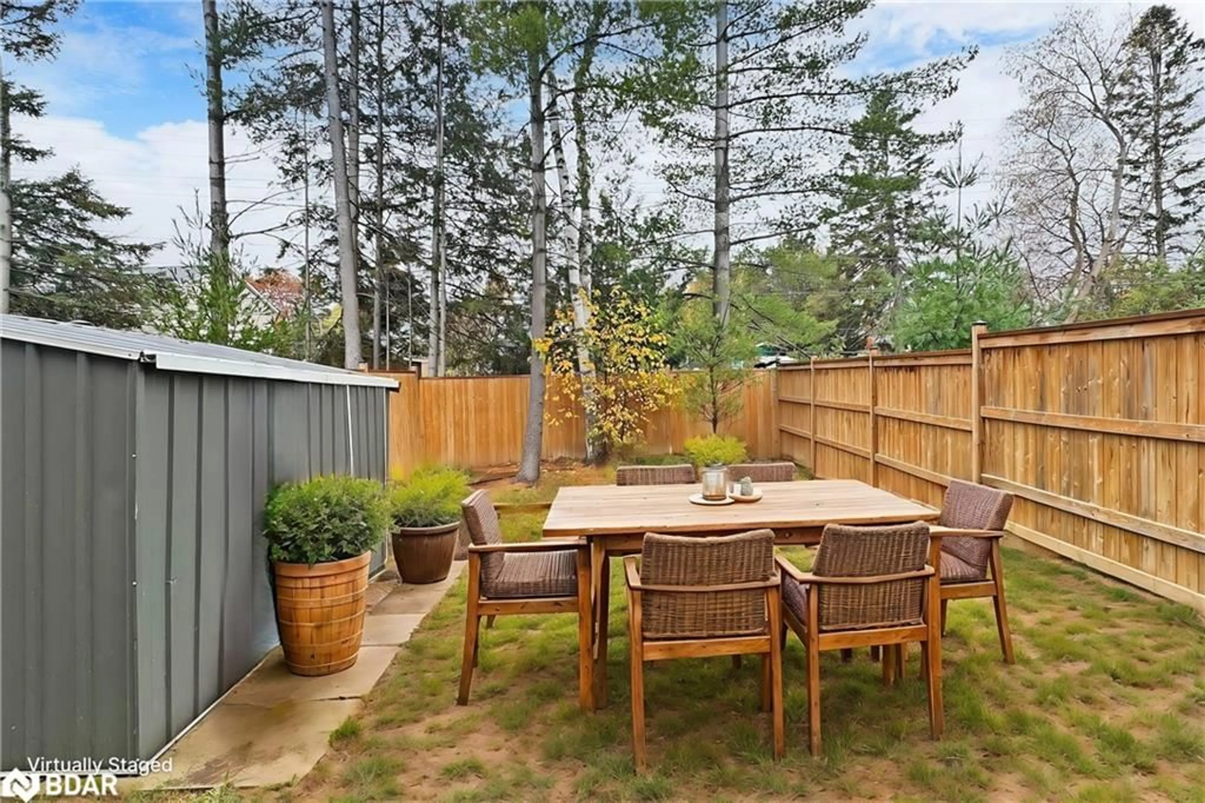 Patio, the fenced backyard for 22 Greenwood Dr, Simcoe Ontario N5A 7L3