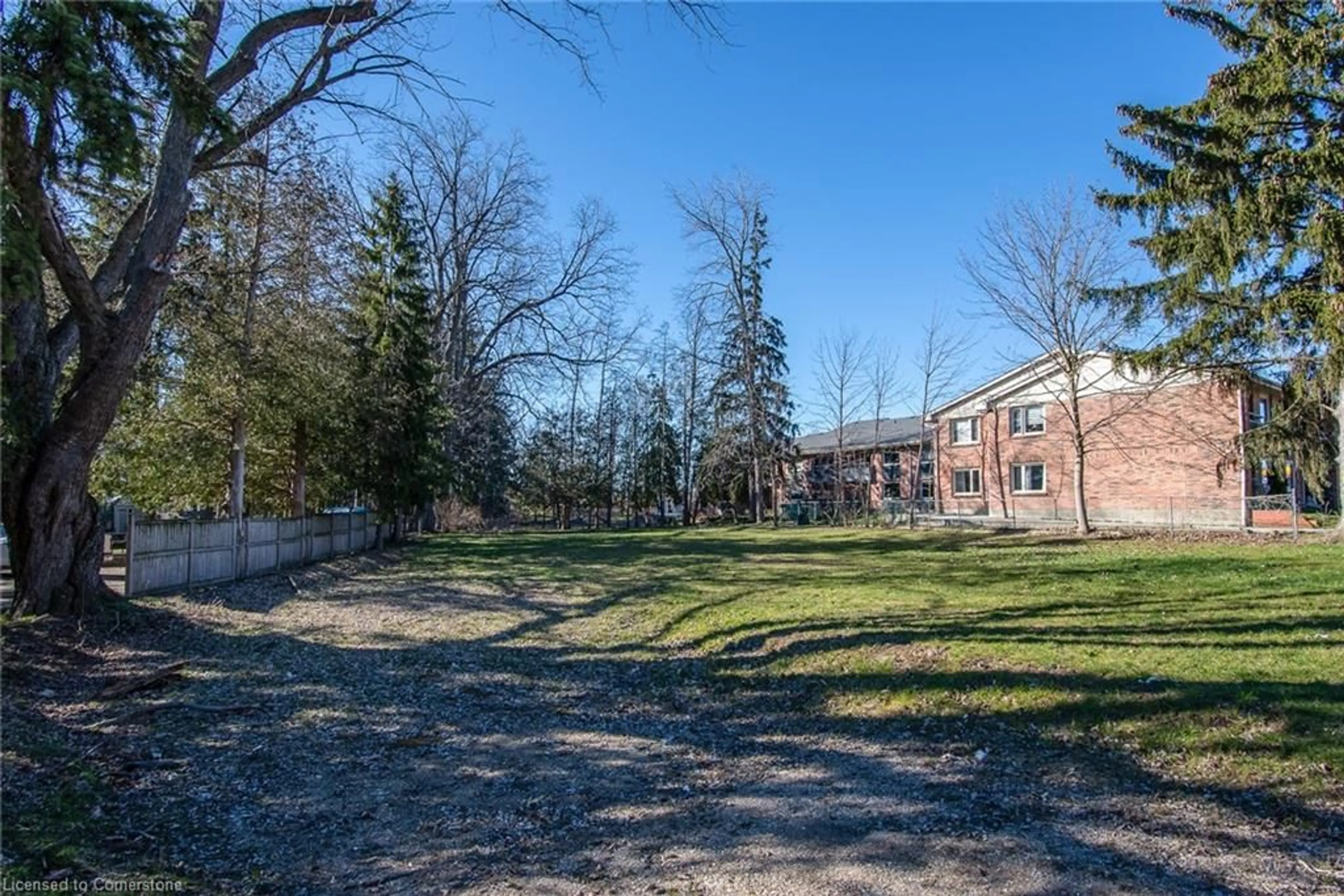 A pic from exterior of the house or condo, the fenced backyard for 140 Waterloo St, New Hamburg Ontario N3A 1T9