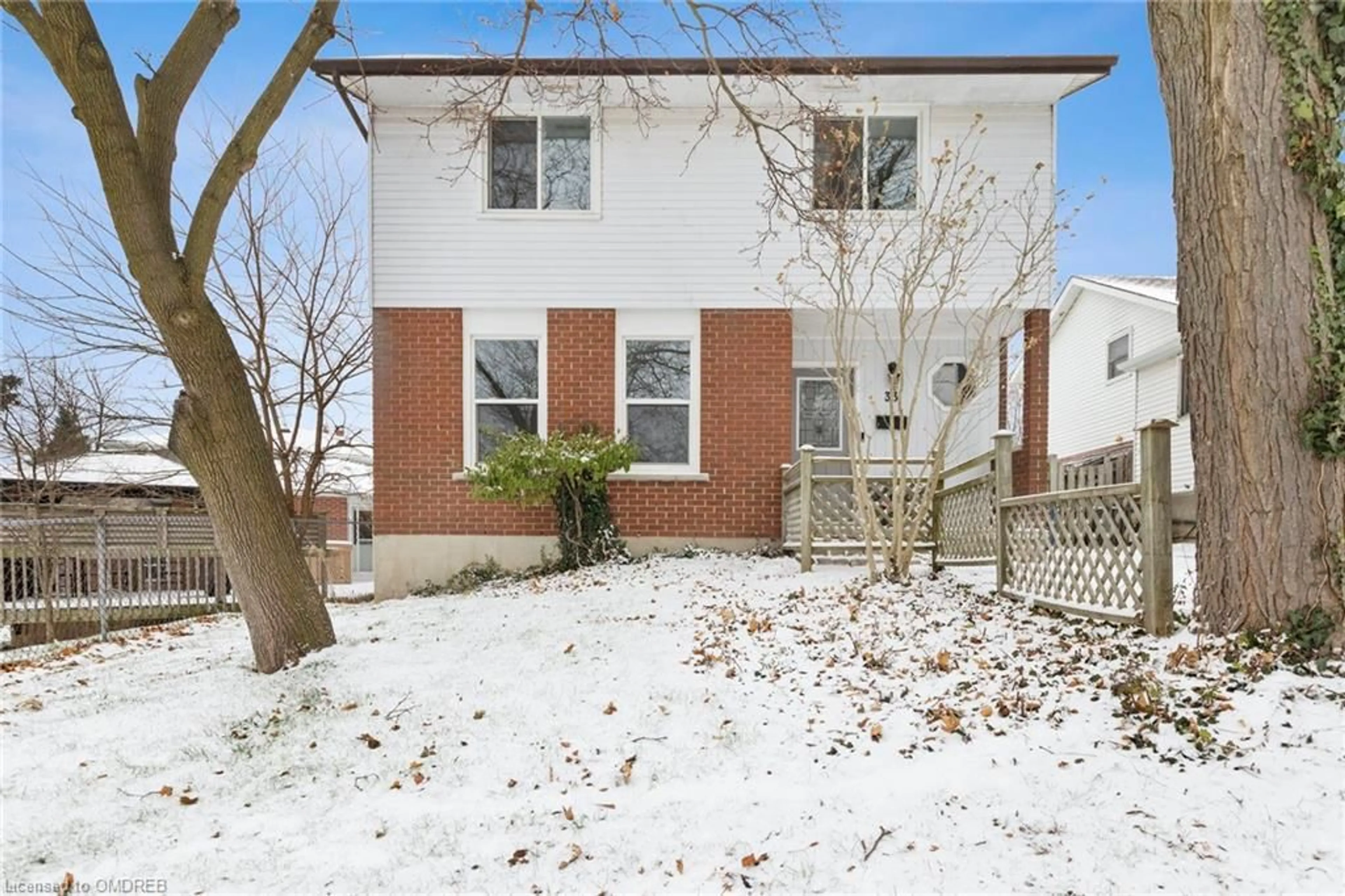 A pic from exterior of the house or condo, the fenced backyard for 33 Upton Cres Cres, Guelph Ontario N1E 6P1