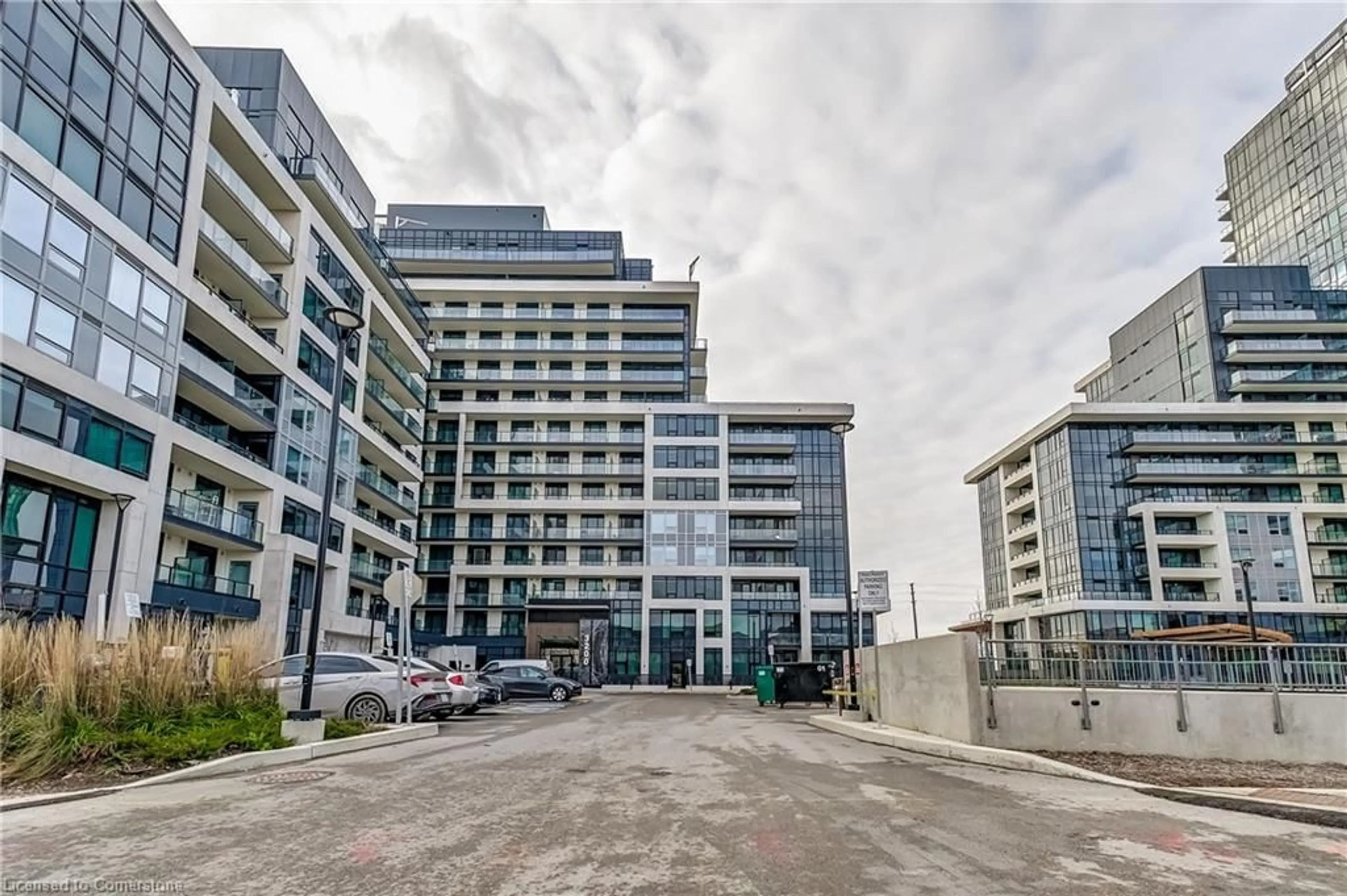 A pic from exterior of the house or condo, the street view for 3200 William Coltson Ave #401, Oakville Ontario L6H 7W6