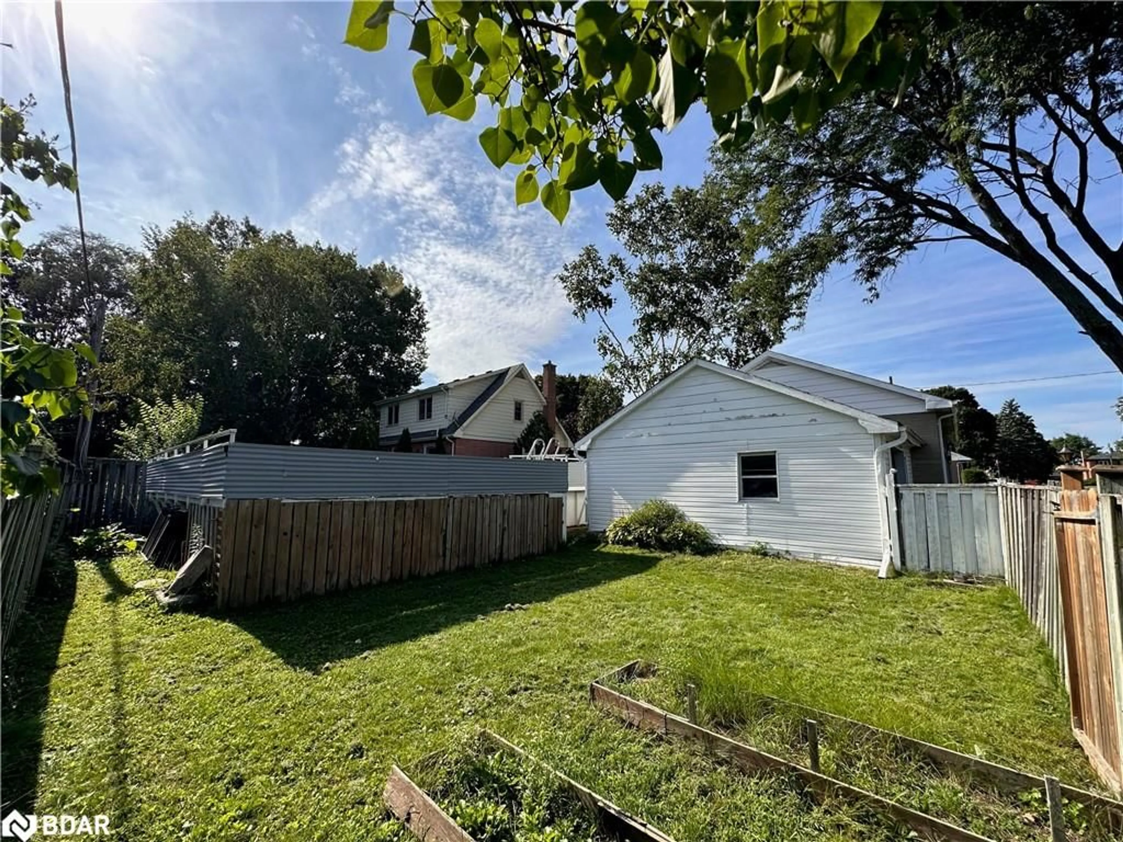 Frontside or backside of a home, the fenced backyard for 6 Woodland Acres Cres, Belleville Ontario K8N 4K1