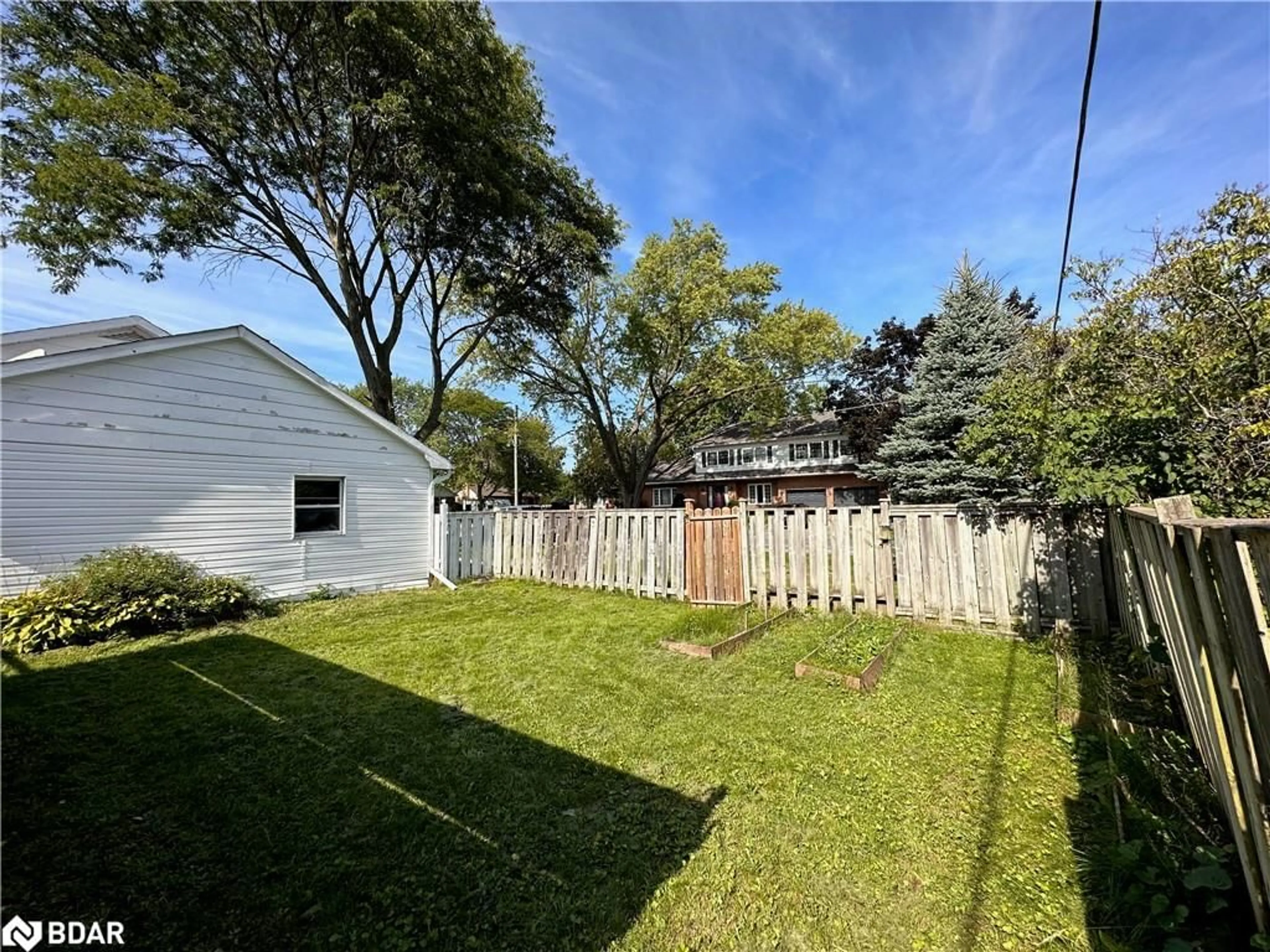 Frontside or backside of a home, the fenced backyard for 6 Woodland Acres Cres, Belleville Ontario K8N 4K1