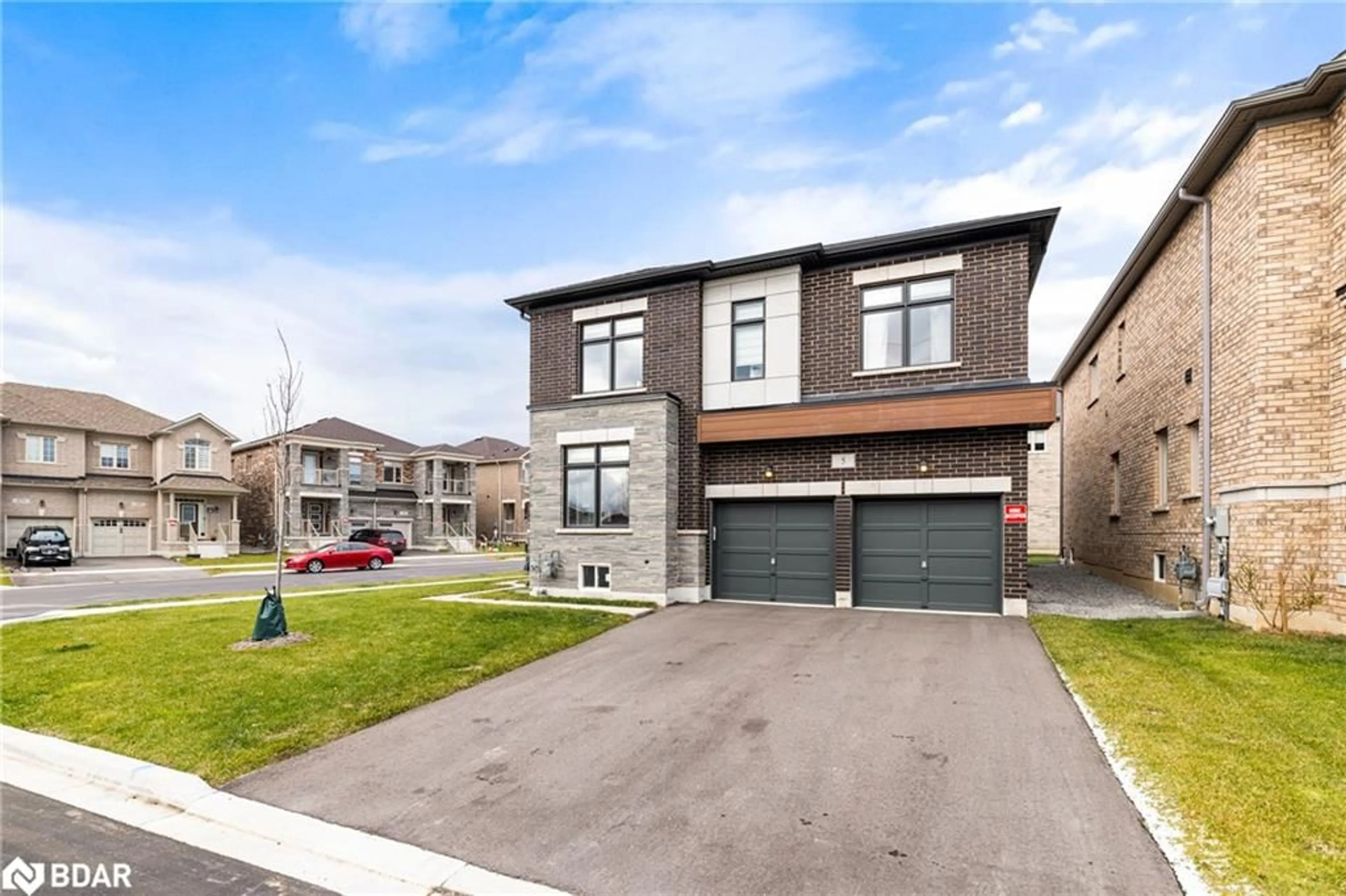 Frontside or backside of a home, the street view for 5 Cattail Cres, Waterdown Ontario L8B 1Z5