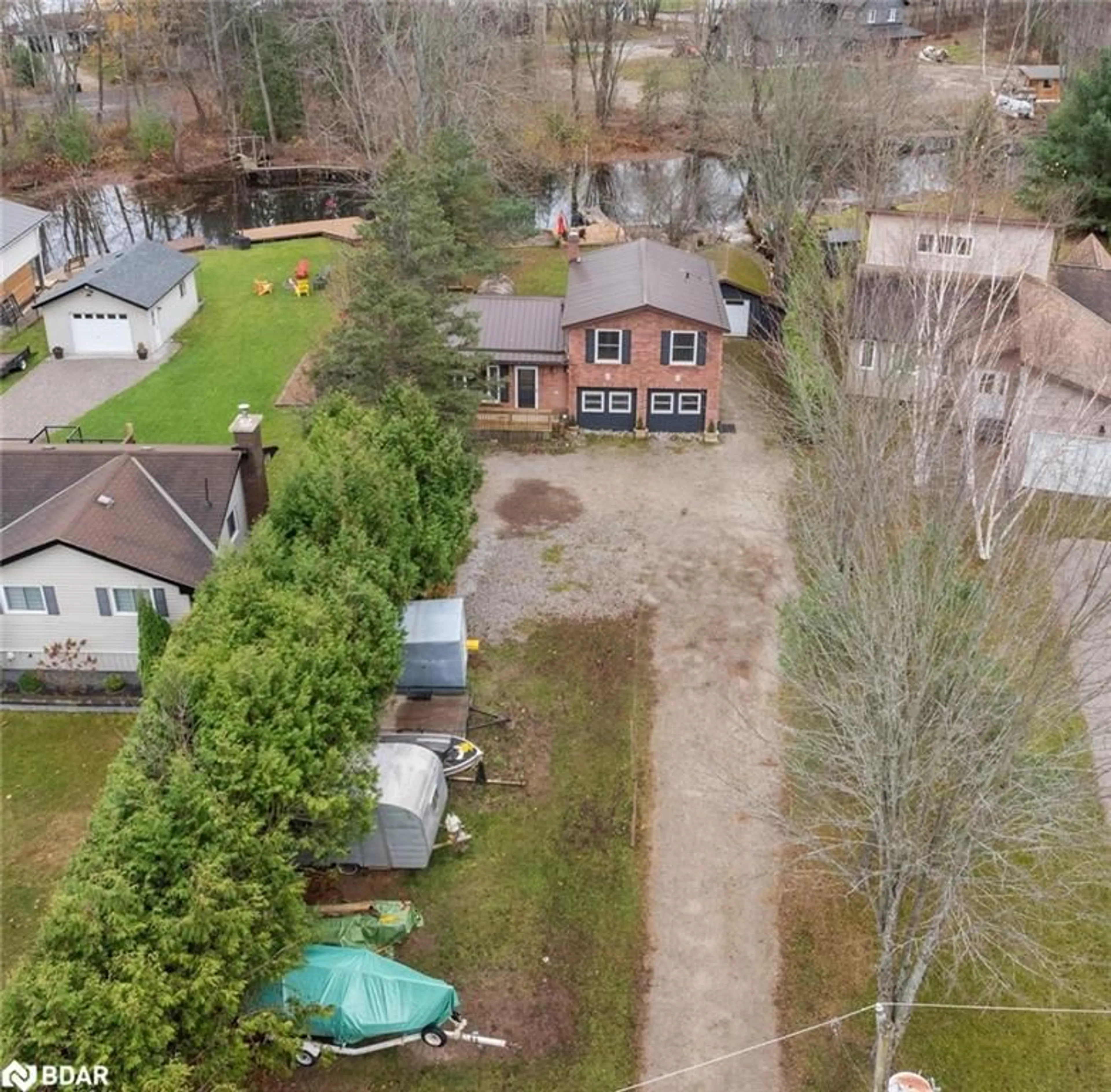 Frontside or backside of a home, the fenced backyard for 2668 Westshore Crescent Cres, West Shore Ontario L3V 0V8