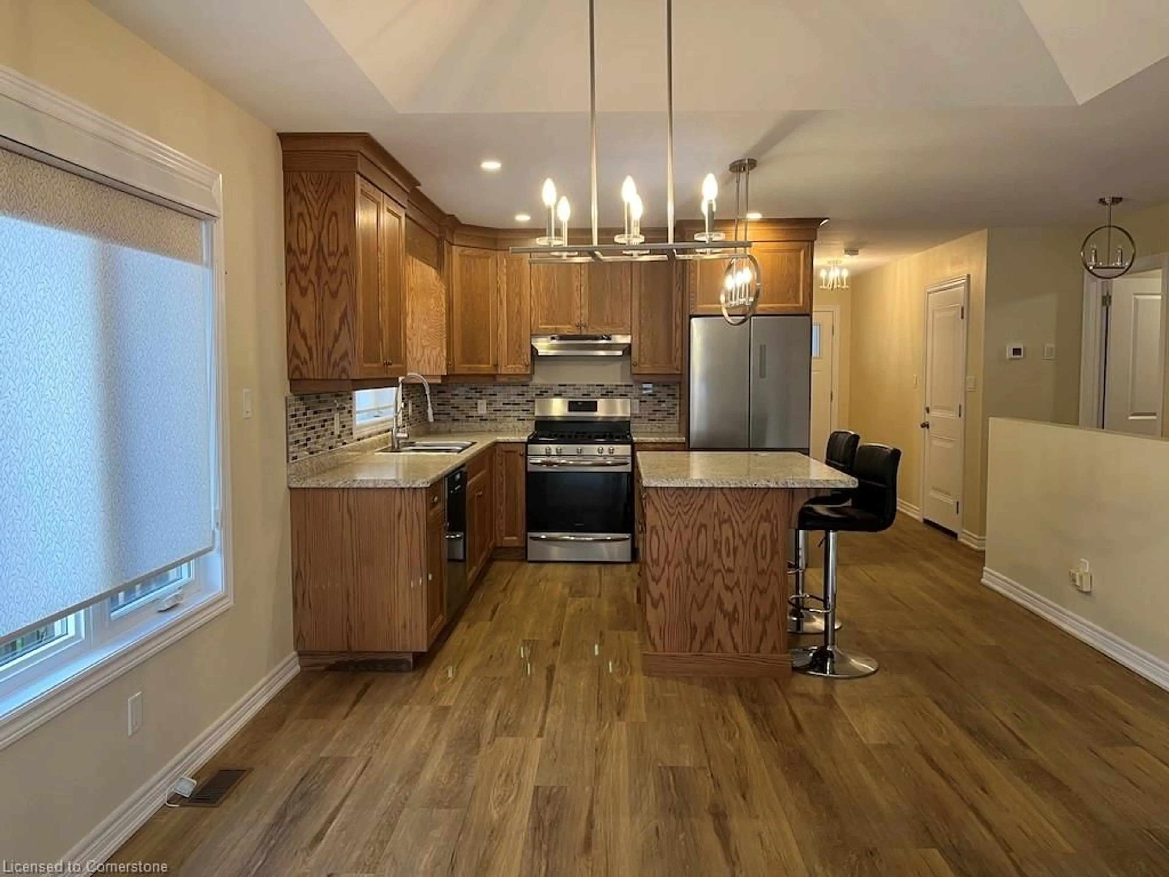 Open concept kitchen for 152 Cross St #9, Dunnville Ontario N1A 1B8