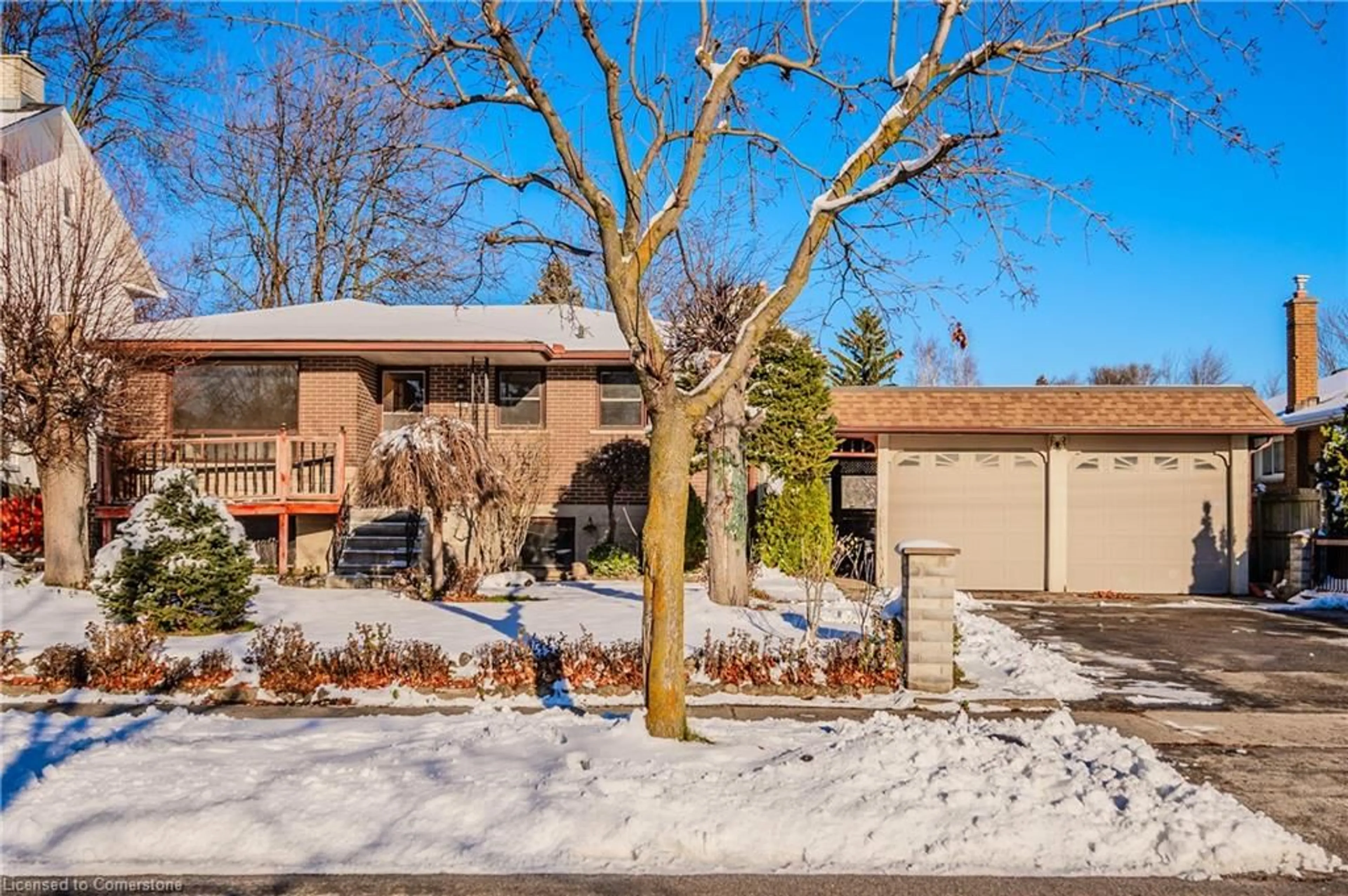 A pic from exterior of the house or condo, the fenced backyard for 80 Kenneth Ave, Kitchener Ontario N2A 1V8