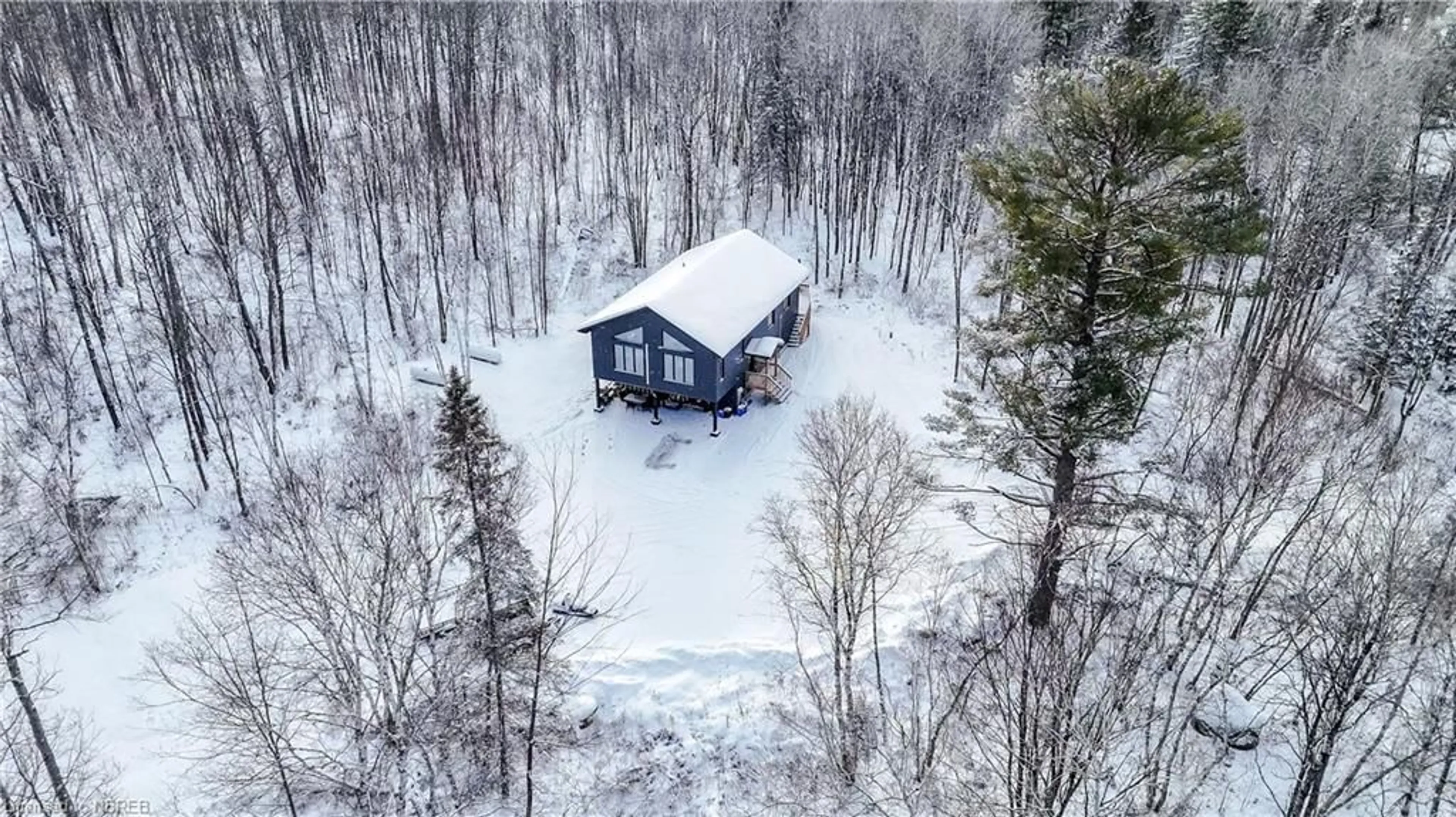 A pic from outside/outdoor area/front of a property/back of a property/a pic from drone, unknown for 260 Latour Cres, Callander Ontario P0H 1H0