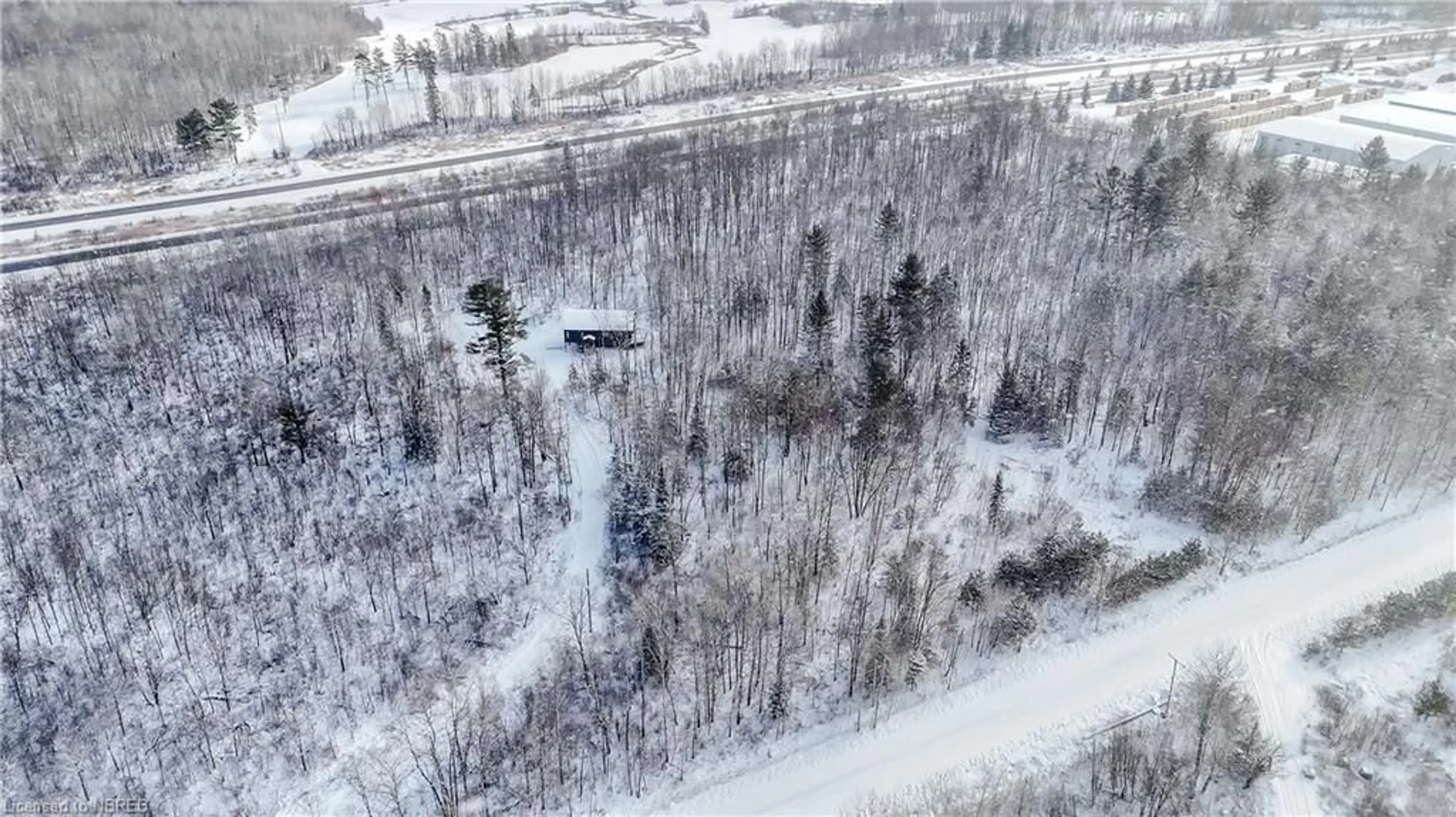 A pic from outside/outdoor area/front of a property/back of a property/a pic from drone, forest/trees view for 260 Latour Cres, Callander Ontario P0H 1H0