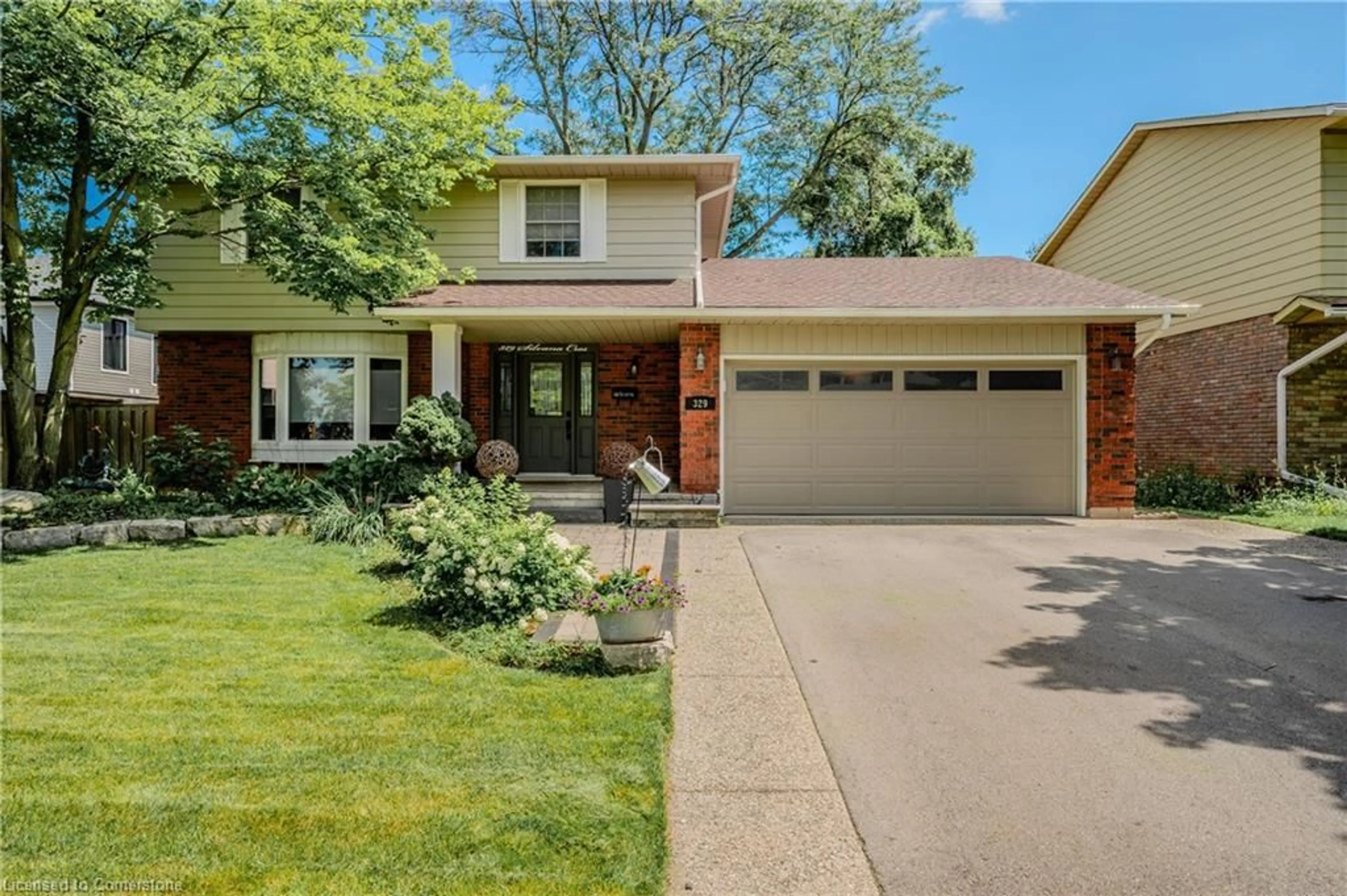 Frontside or backside of a home, the street view for 329 Silvana Cres, Burlington Ontario L7L 2W3