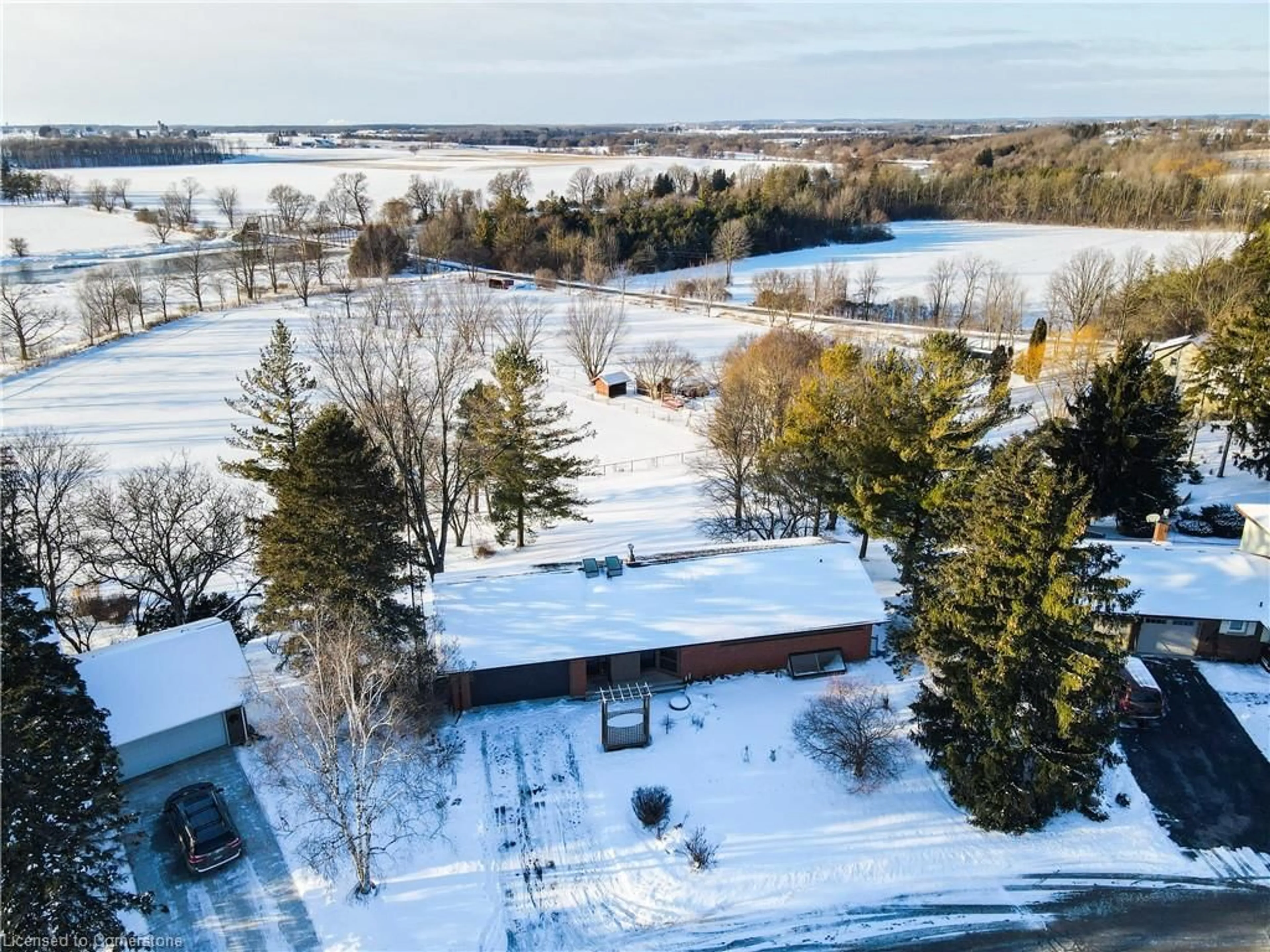 A pic from outside/outdoor area/front of a property/back of a property/a pic from drone, water/lake/river/ocean view for 44 Sunset Dr, West Montrose Ontario N0B 2V0