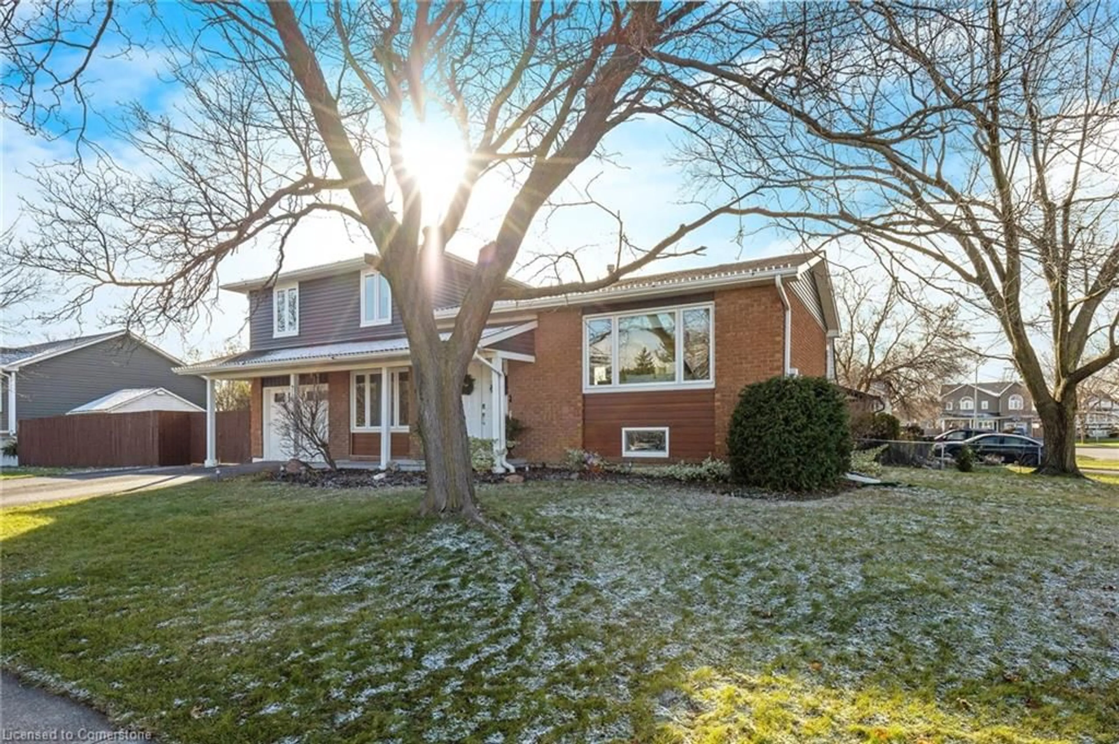 Frontside or backside of a home, the fenced backyard for 710 Applewood Cres, Milton Ontario L9T 3C4