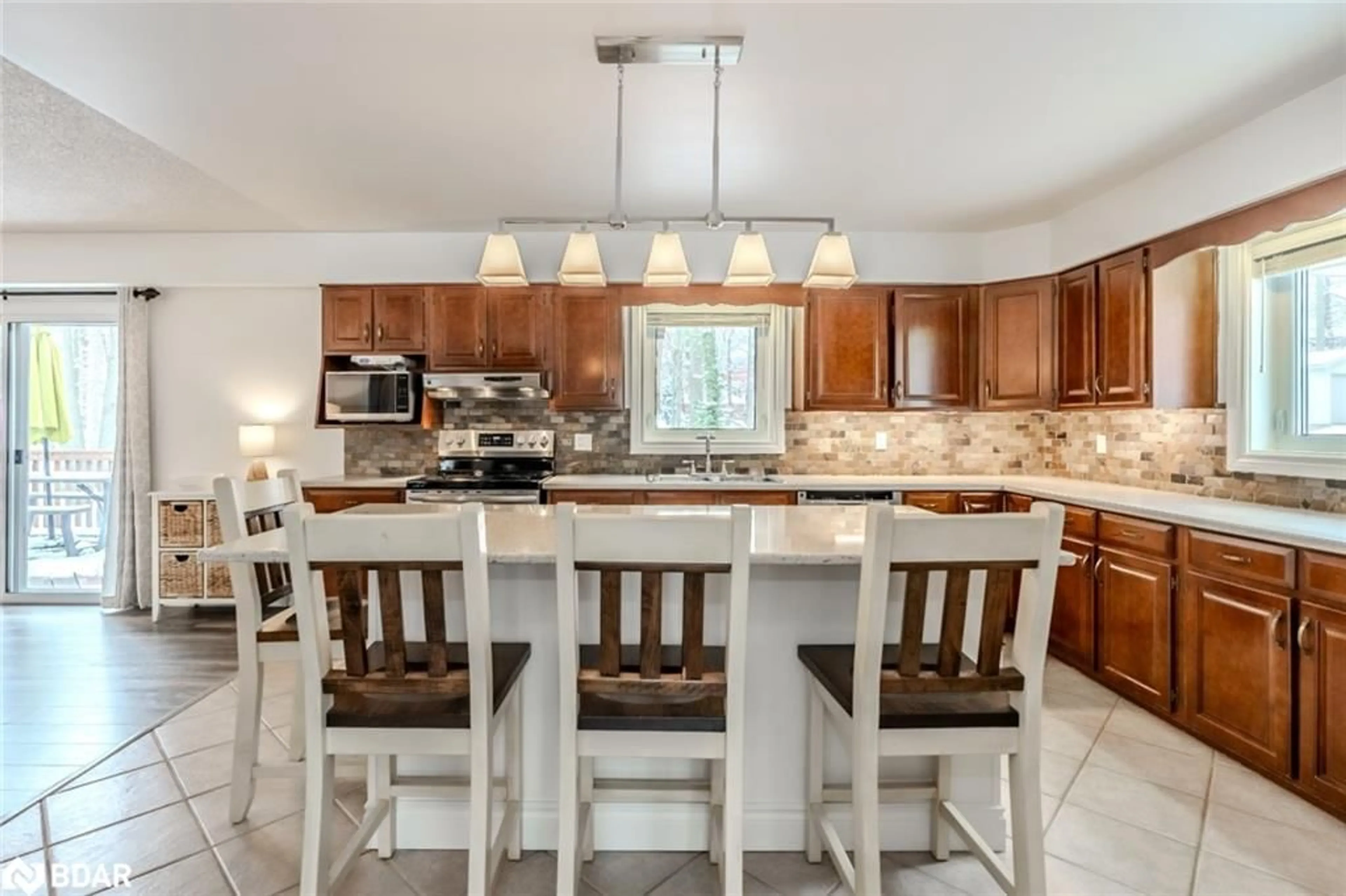 Open concept kitchen for 1166 Sunnidale Rd, Springwater Ontario L4M 4S4