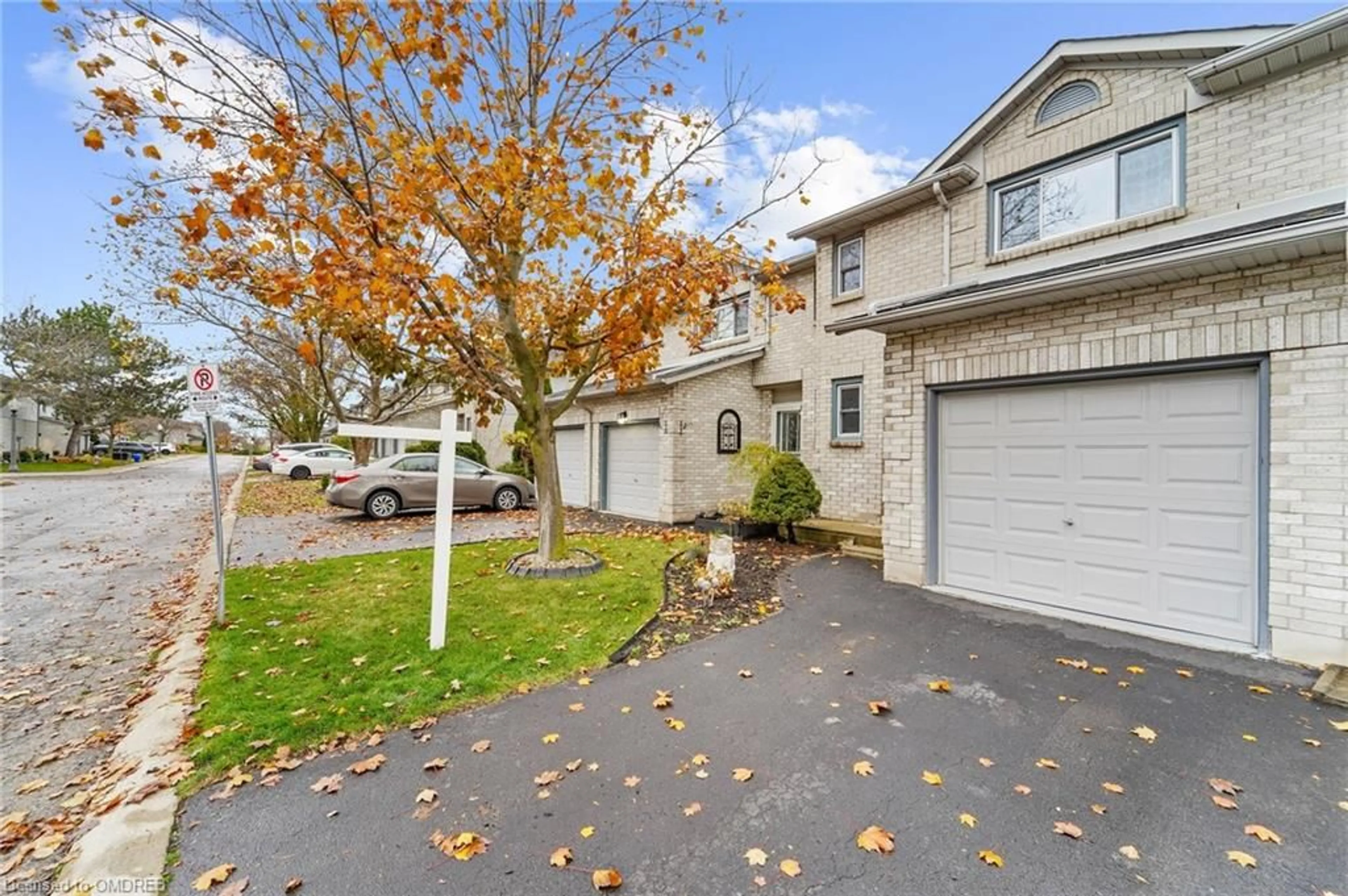 A pic from exterior of the house or condo, the fenced backyard for 2 Royalwood Crt, Stoney Creek Ontario L8E 4Z1