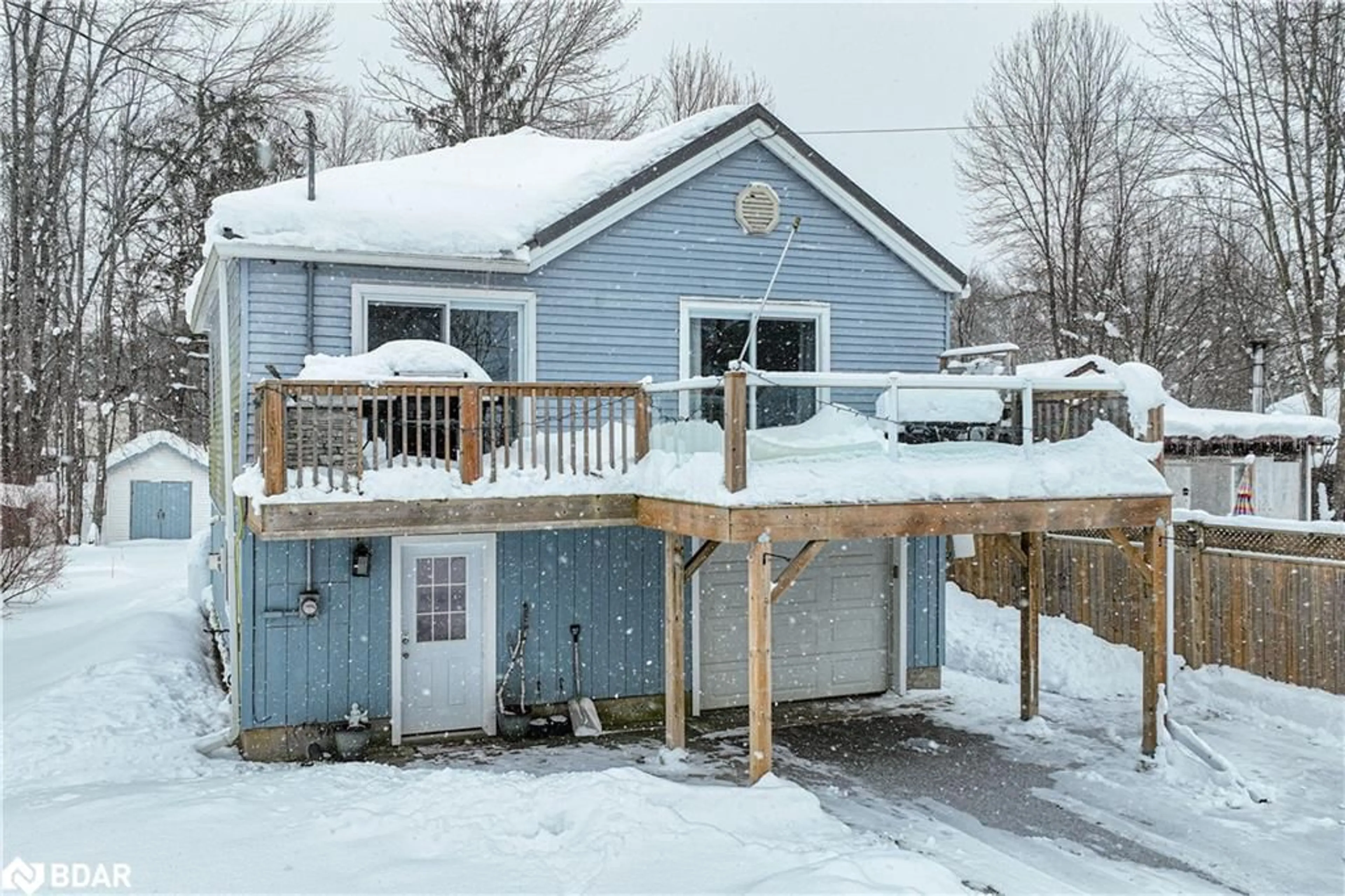 Frontside or backside of a home, cottage for 7187 Beach Dr, Washago Ontario L0K 2B0