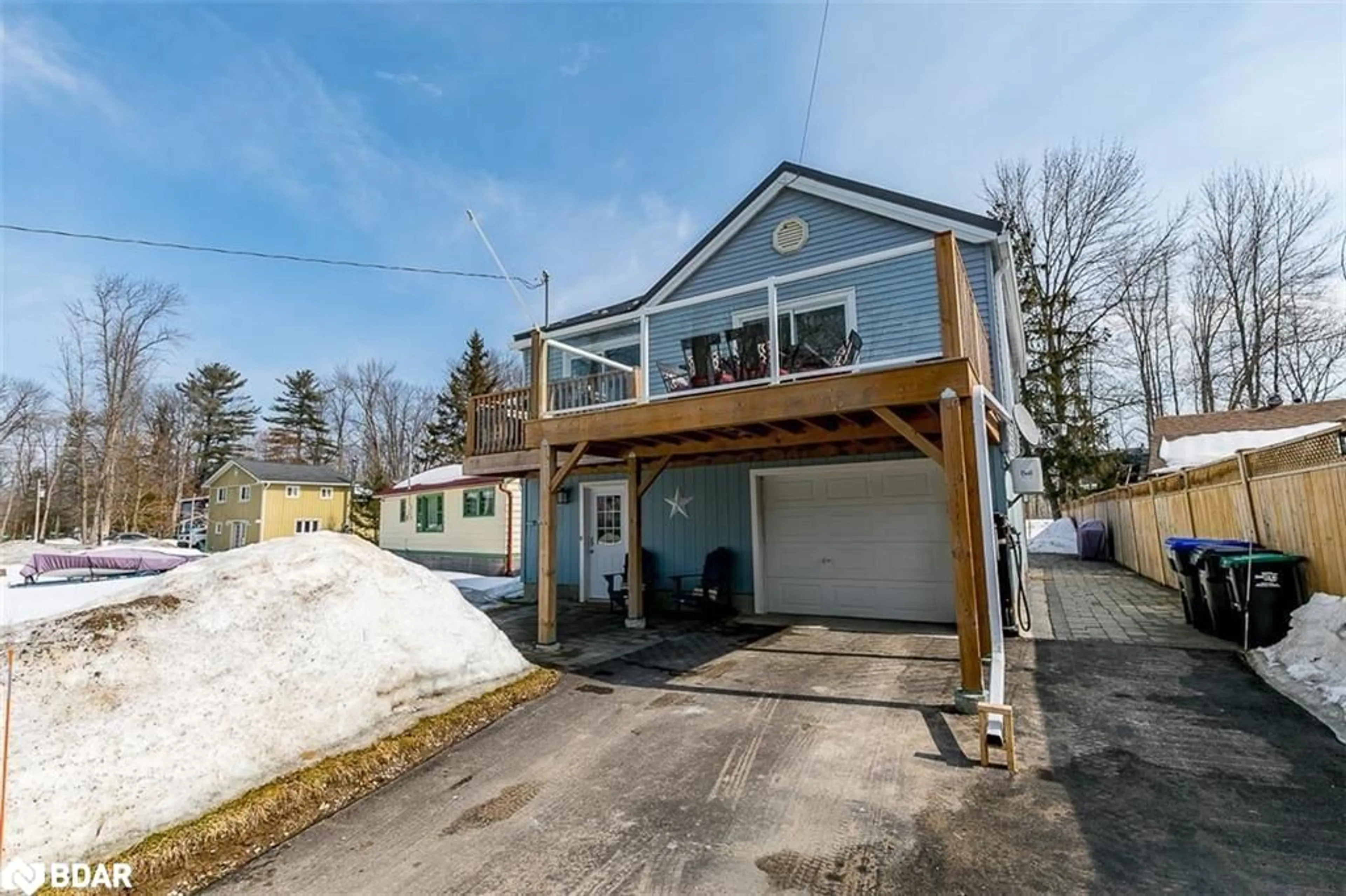 Frontside or backside of a home, cottage for 7187 Beach Dr, Washago Ontario L0K 2B0