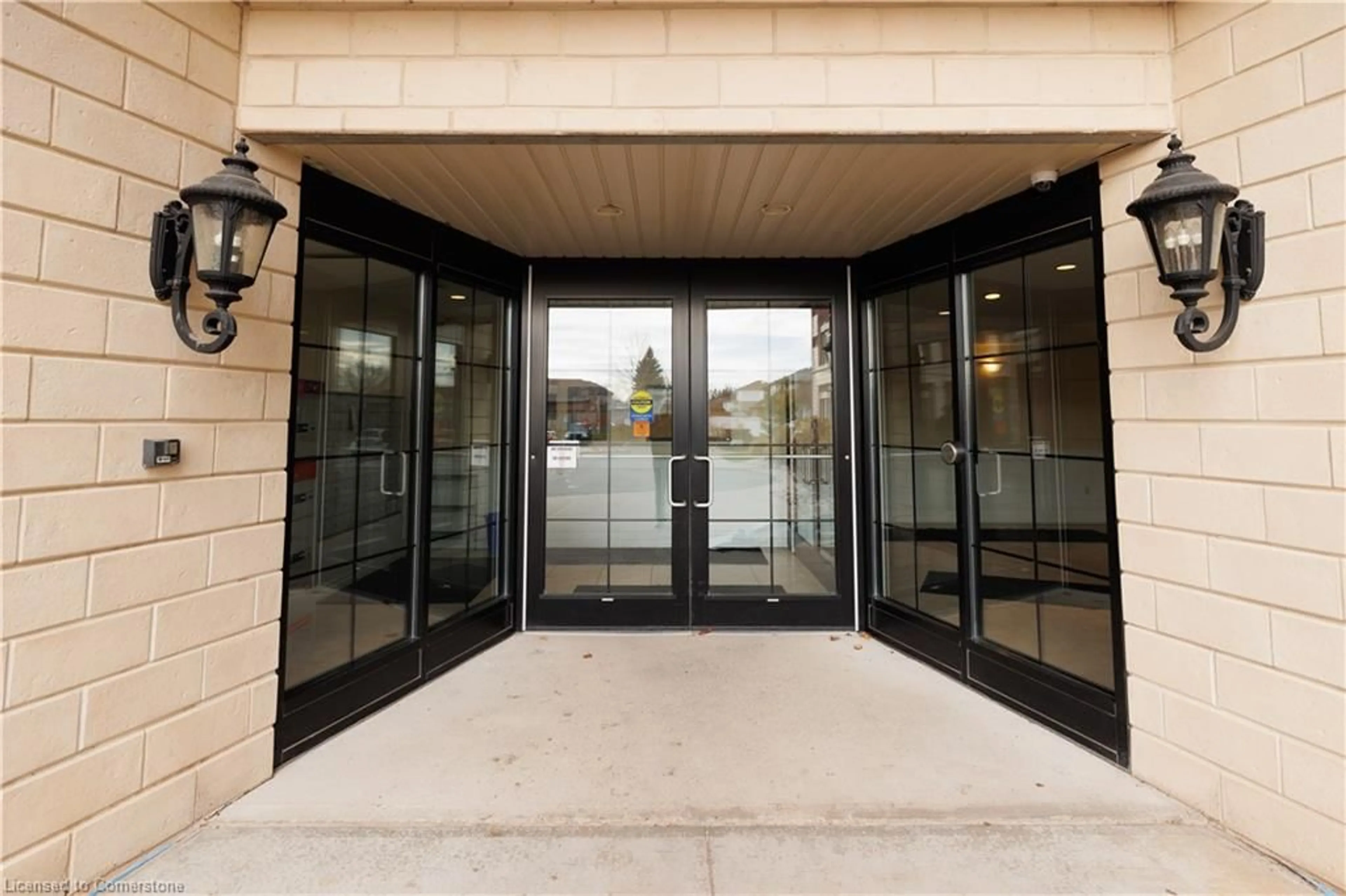 Indoor foyer, cement floor for 308 Watson Pky #407, Guelph Ontario N1E 0G7