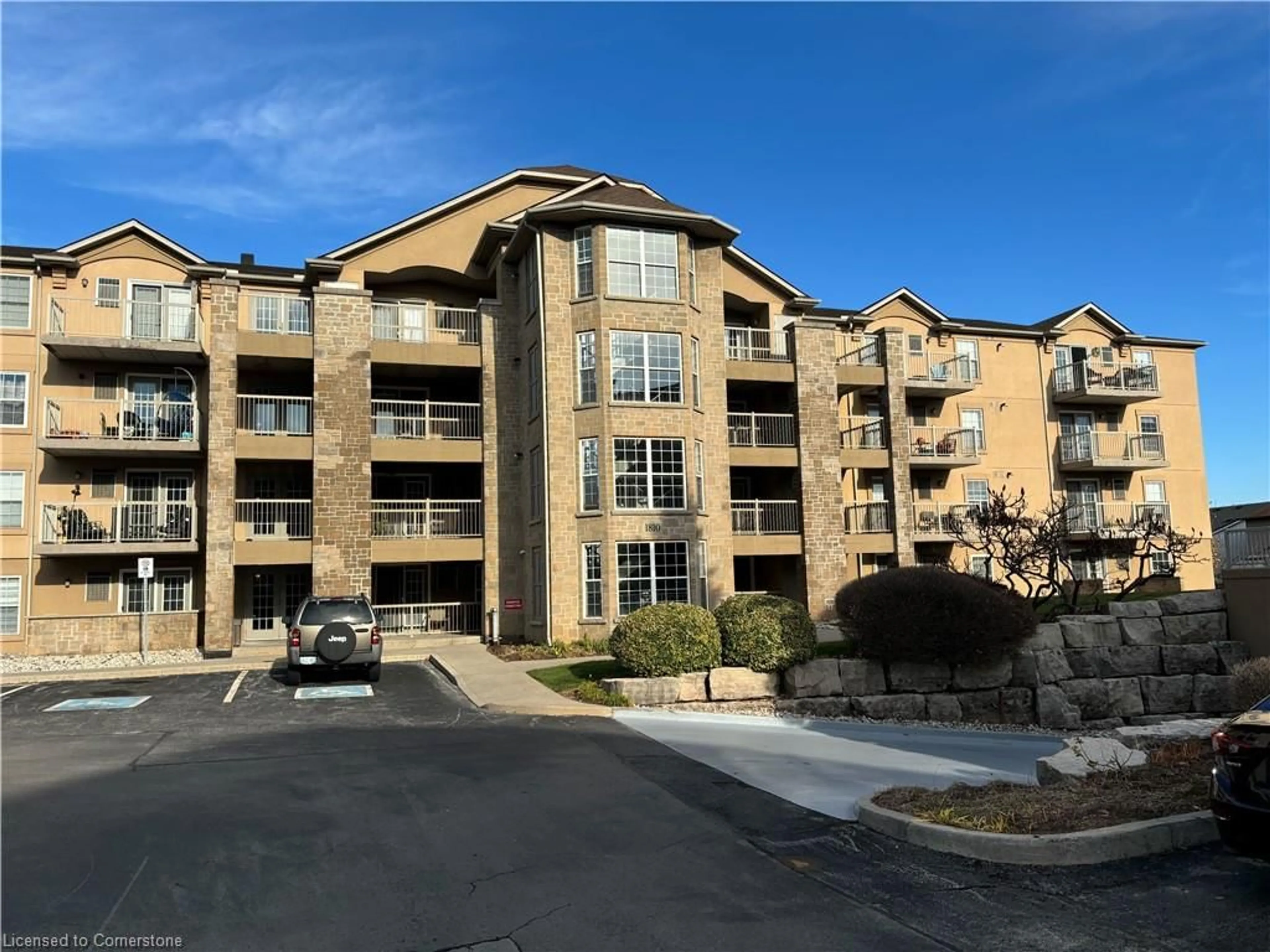 A pic from exterior of the house or condo, the front or back of building for 1810 Walkers Line #303, Burlington Ontario L7M 4V3