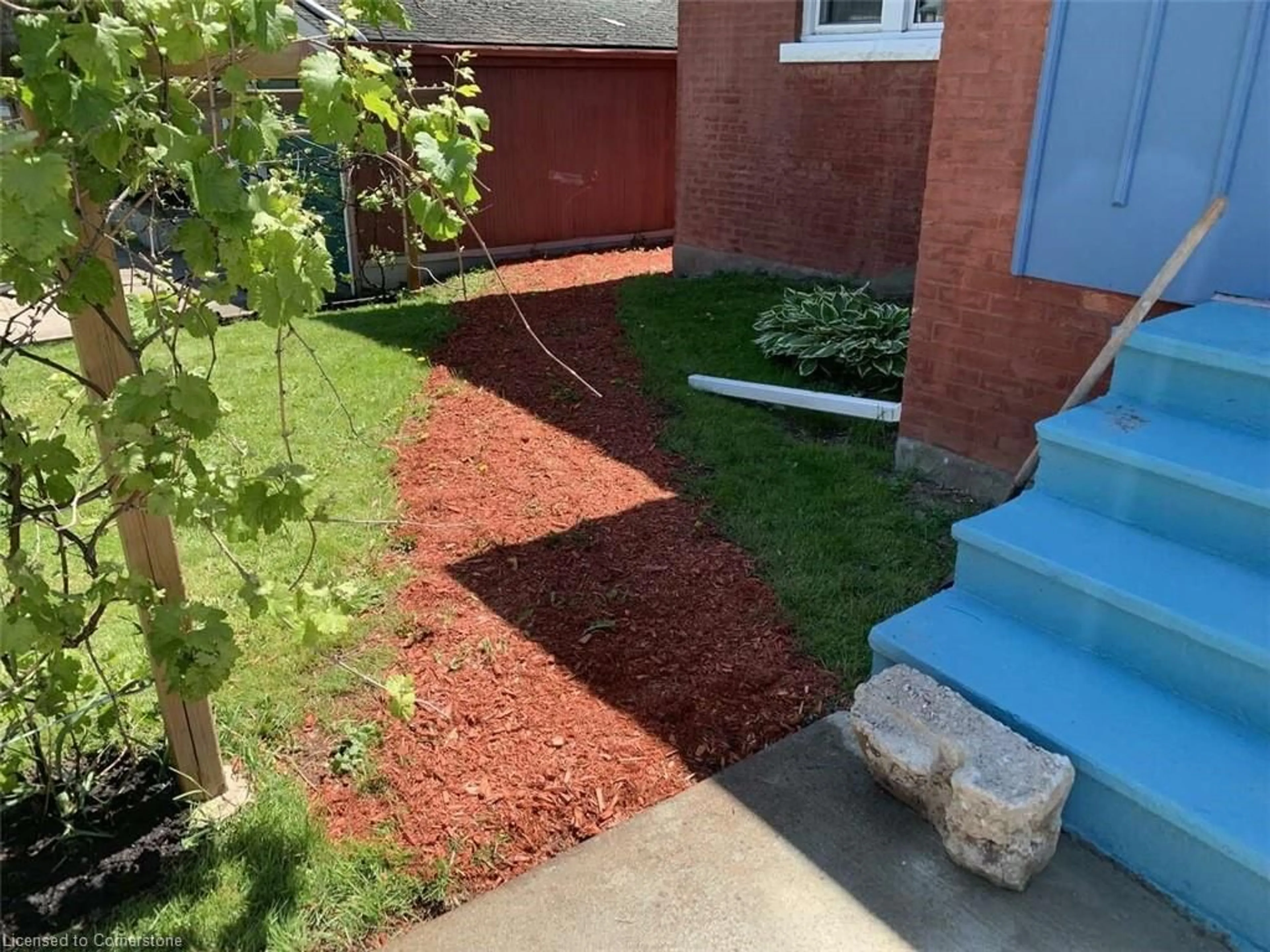 Frontside or backside of a home, the fenced backyard for 4322 Bampfield St, Niagara Falls Ontario L2E 1G8