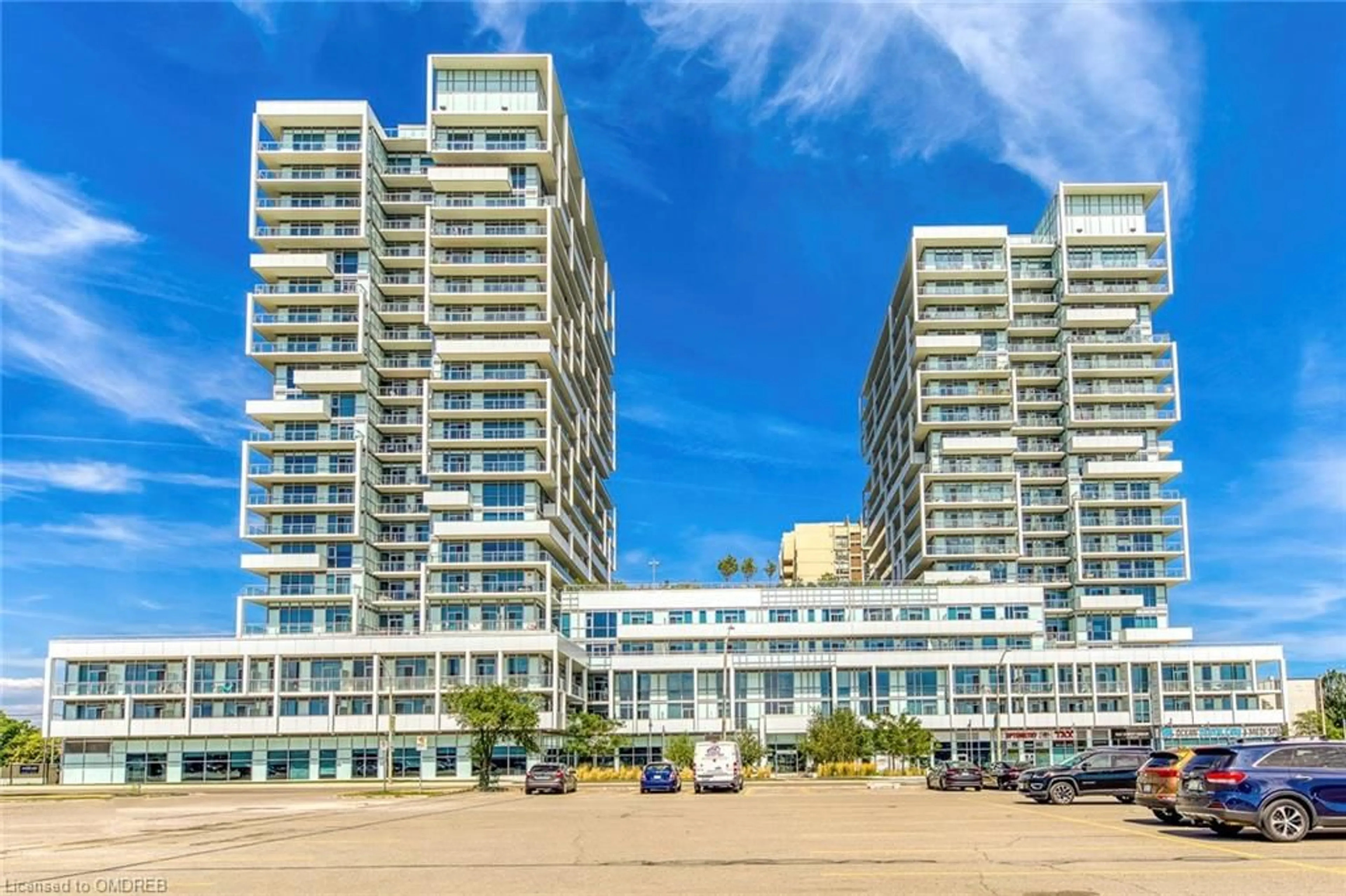 A pic from exterior of the house or condo, the view of city buildings for 65 Speers Road #310, Oakville Ontario L6K 0J1