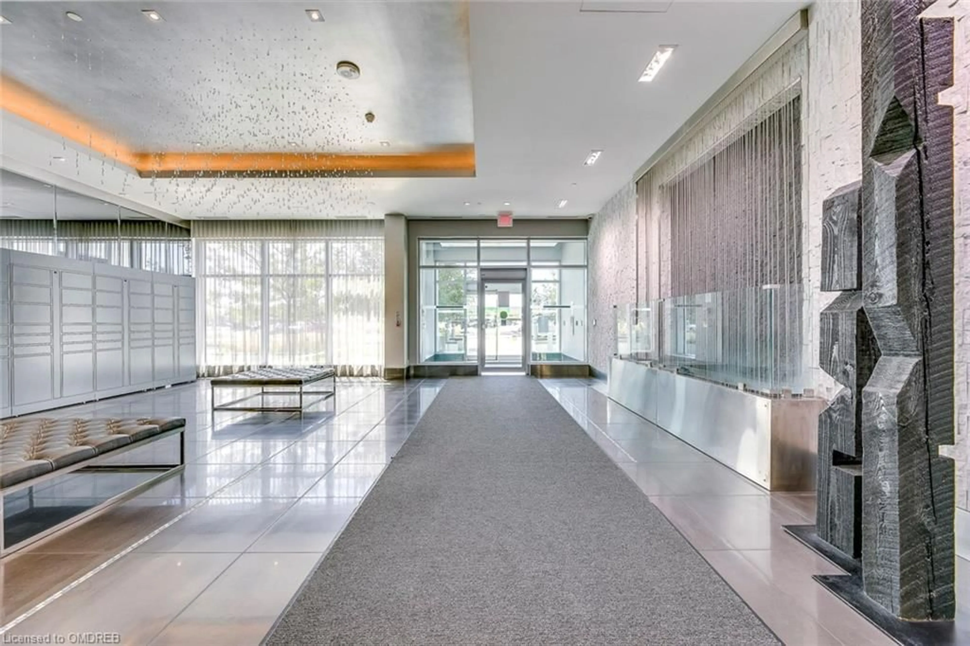 Indoor lobby, cement floor for 65 Speers Road #310, Oakville Ontario L6K 0J1