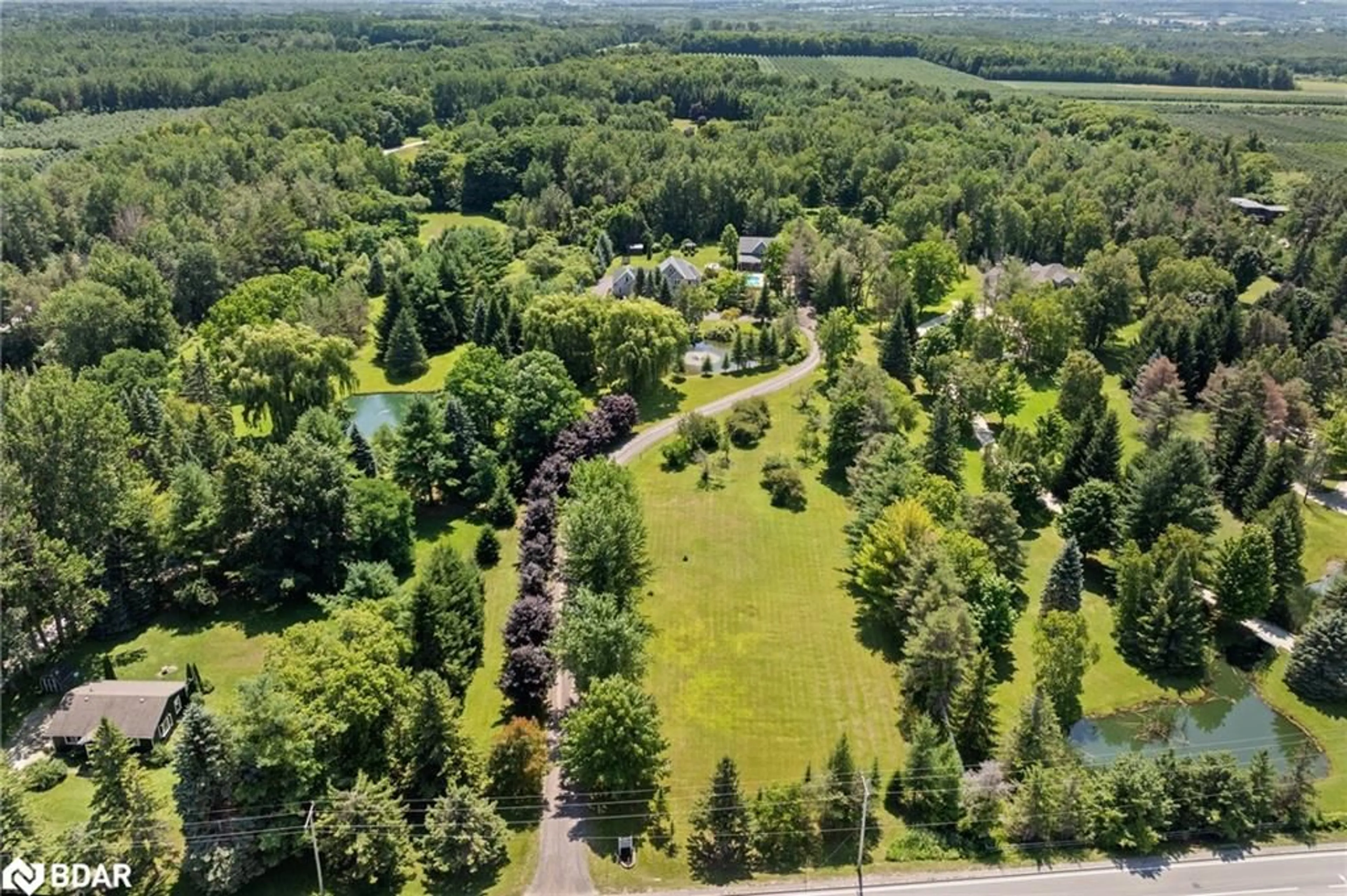 A pic from outside/outdoor area/front of a property/back of a property/a pic from drone, forest/trees view for 7833 Poplar Sideroad, Clearview Ontario L9Y 5N4