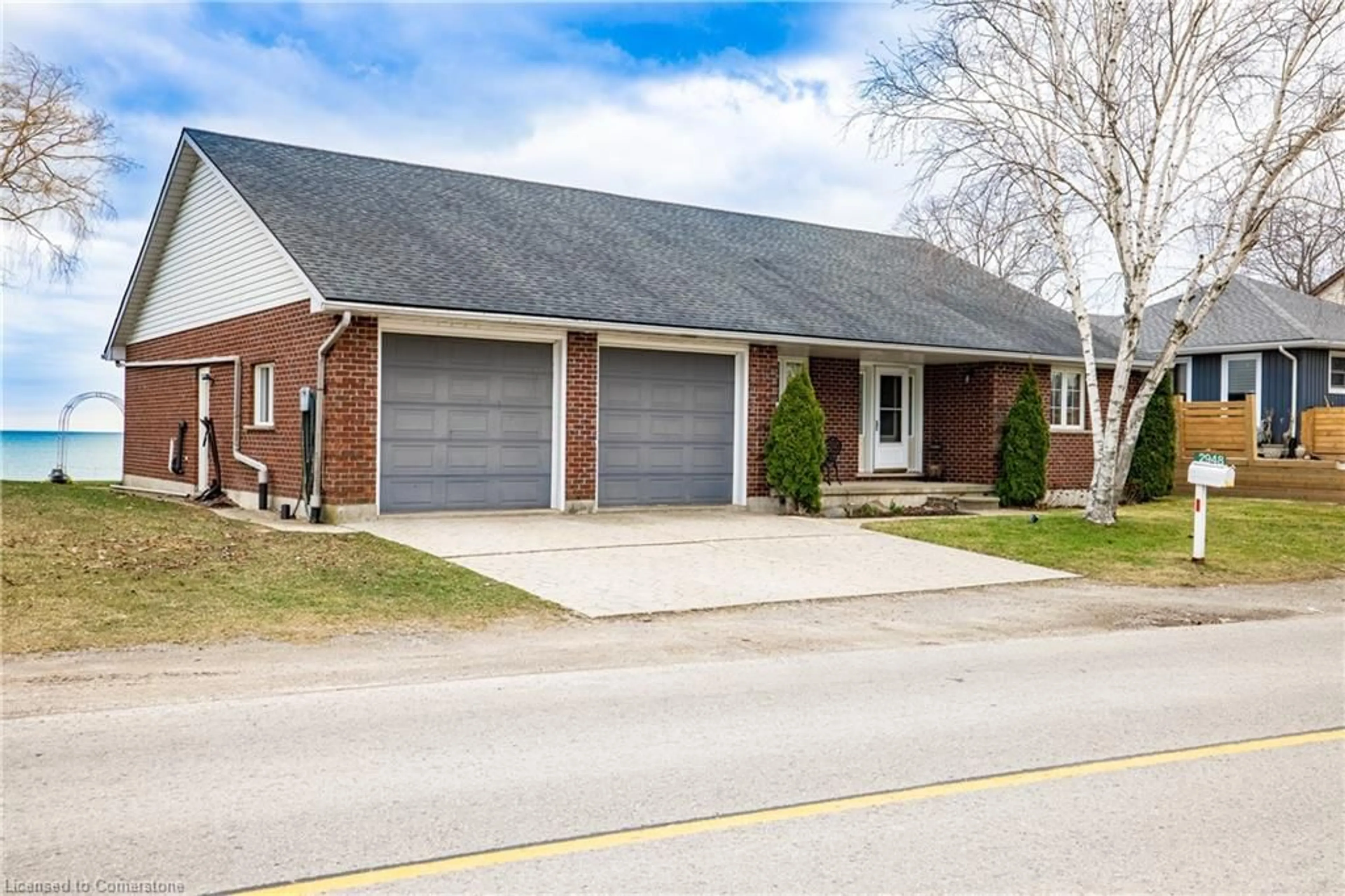 Home with brick exterior material for 2948 North Shore Dr, Lowbanks Ontario N0A 1K0