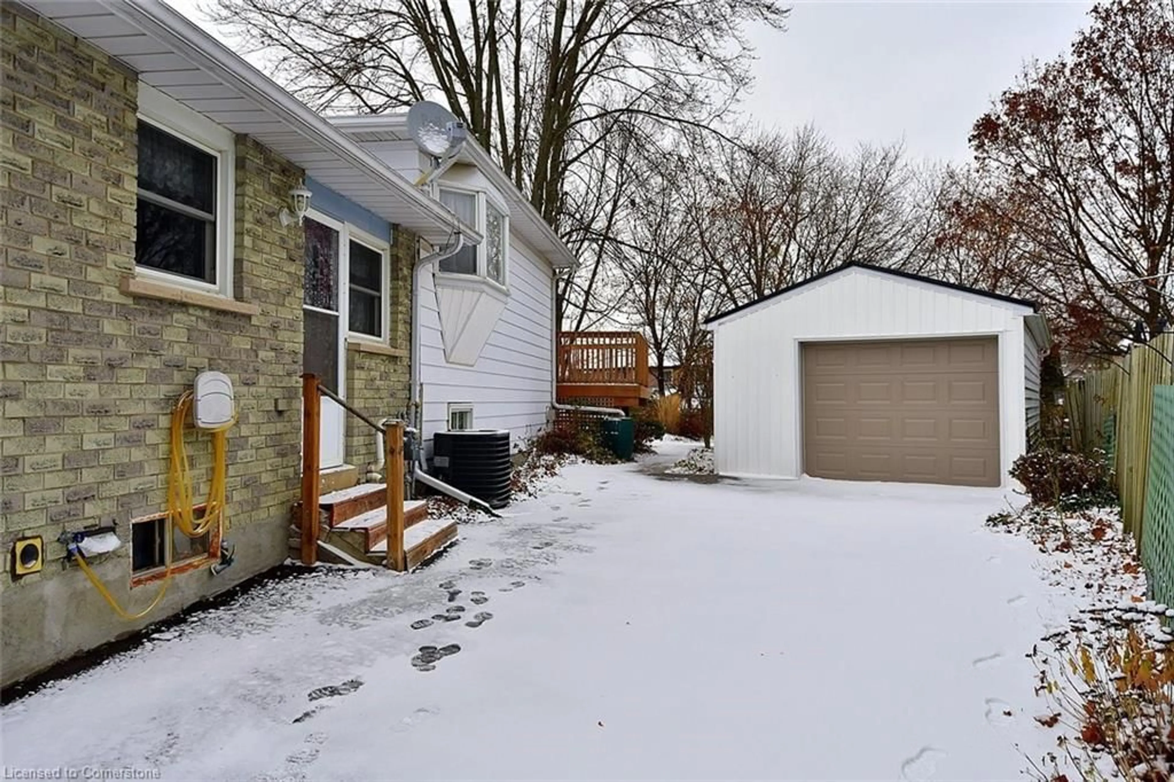 A pic from exterior of the house or condo, the fenced backyard for 22 Maple Cres, Paris Ontario N3L 3R4