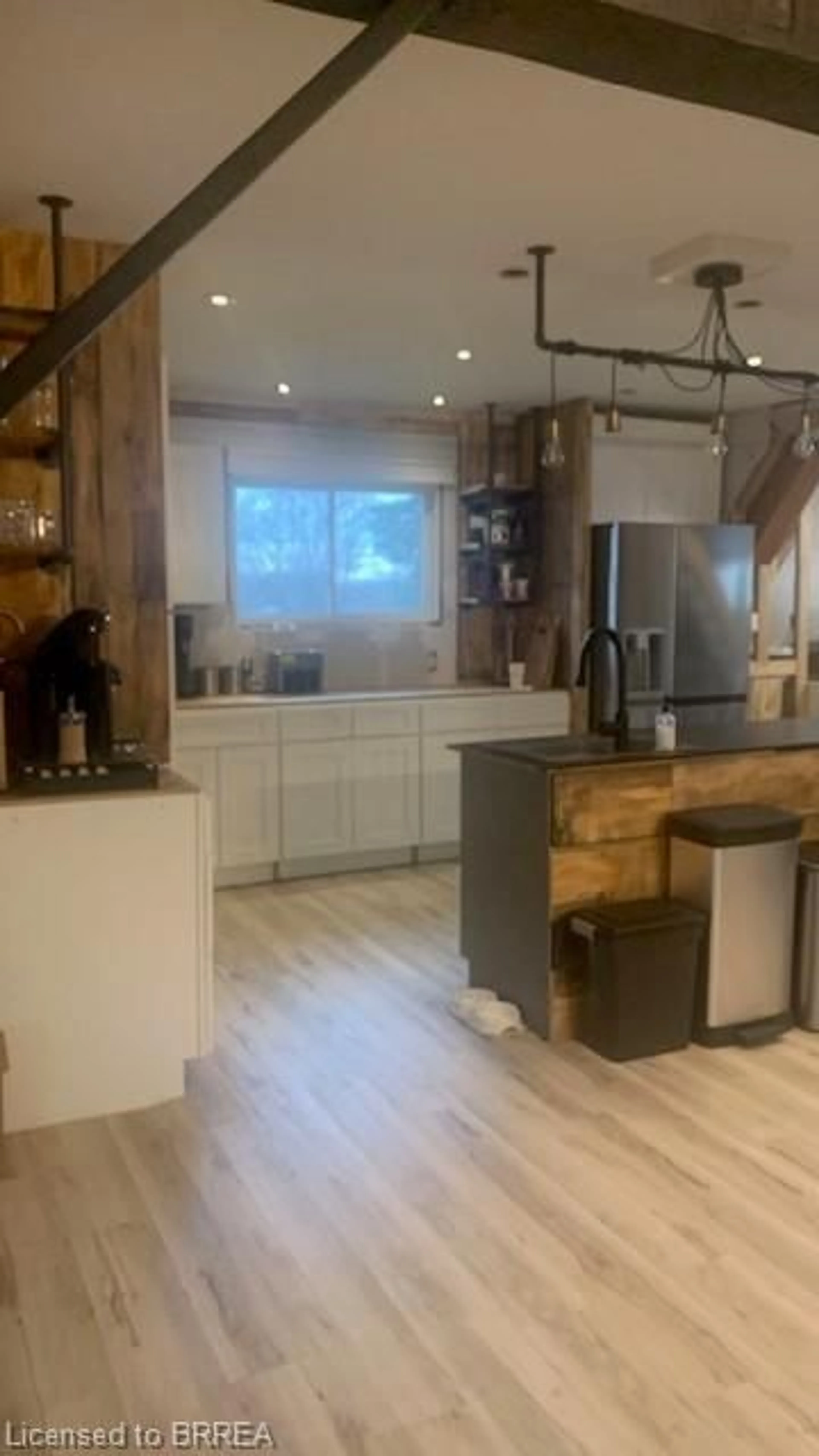 Open concept kitchen, wood/laminate floor for 34 Slaght St, Waterford Ontario N0E 1Y0