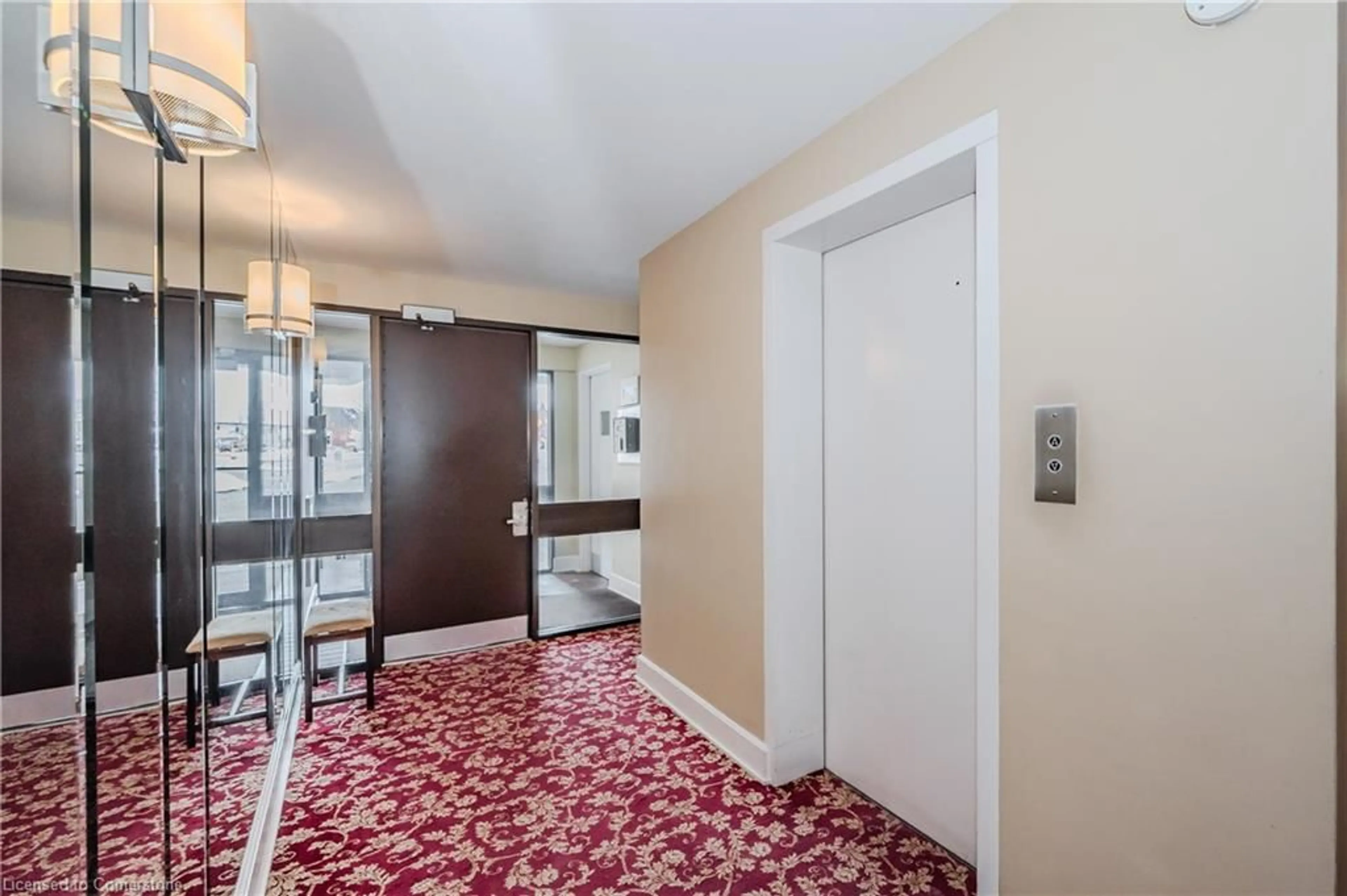 Indoor foyer, carpet floors for 43 Caroline St #302, Waterloo Ontario N2L 2Y5