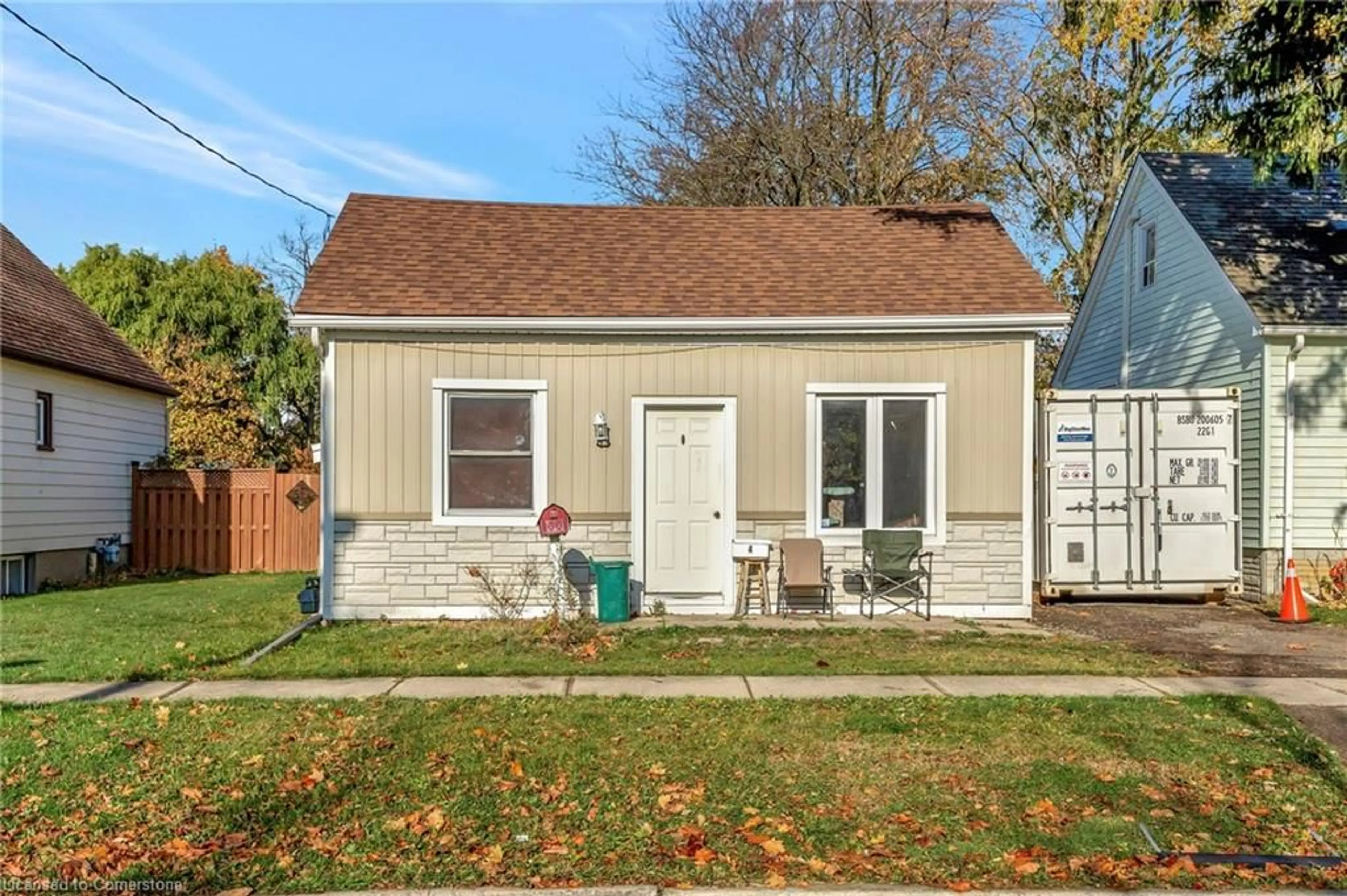 Frontside or backside of a home, the fenced backyard for 4 Rebecca St, St. Catharines Ontario L2S 2G8