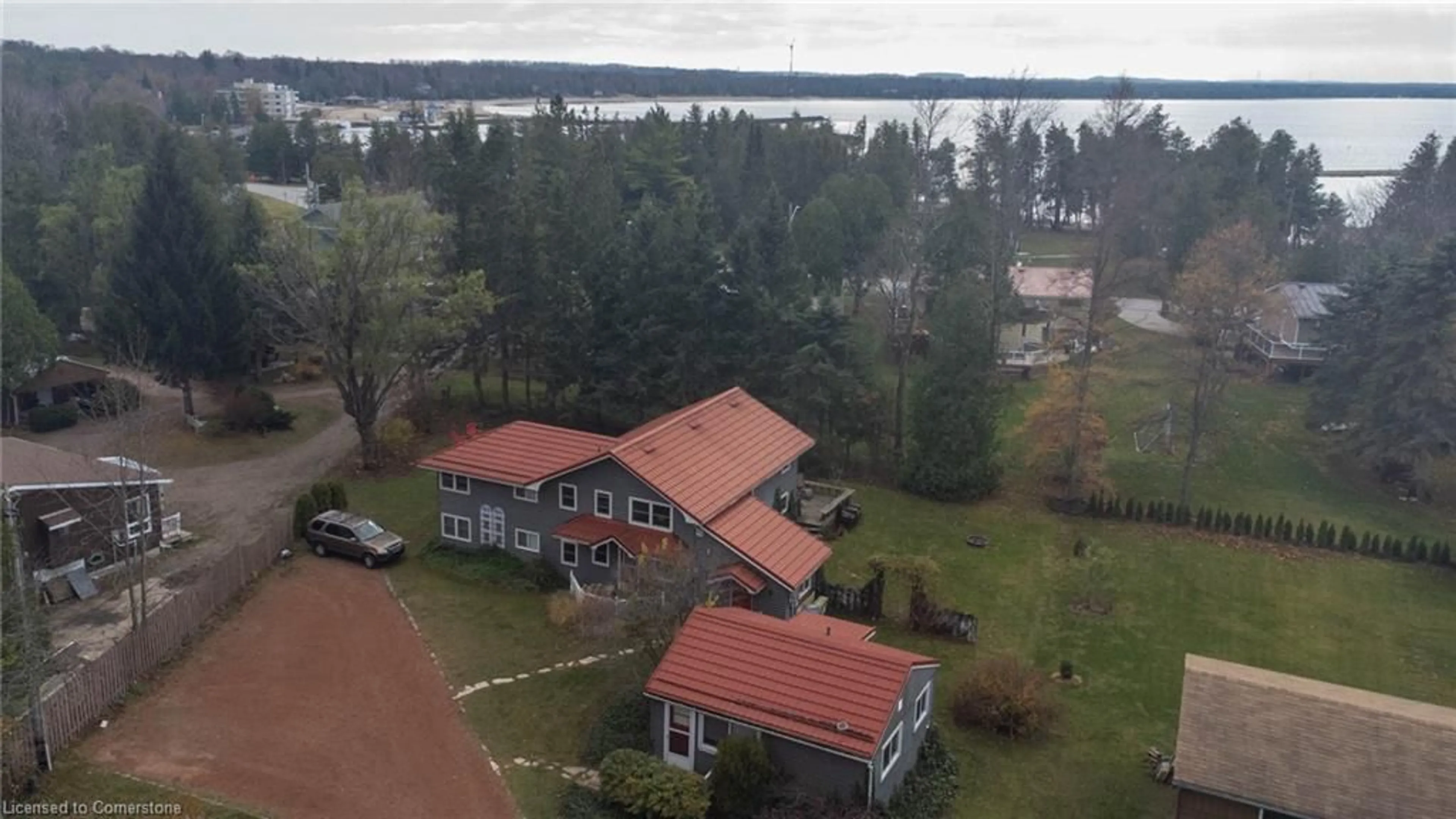 A pic from outside/outdoor area/front of a property/back of a property/a pic from drone, water/lake/river/ocean view for 24 Arthur St, Port Elgin Ontario N0H 2C5