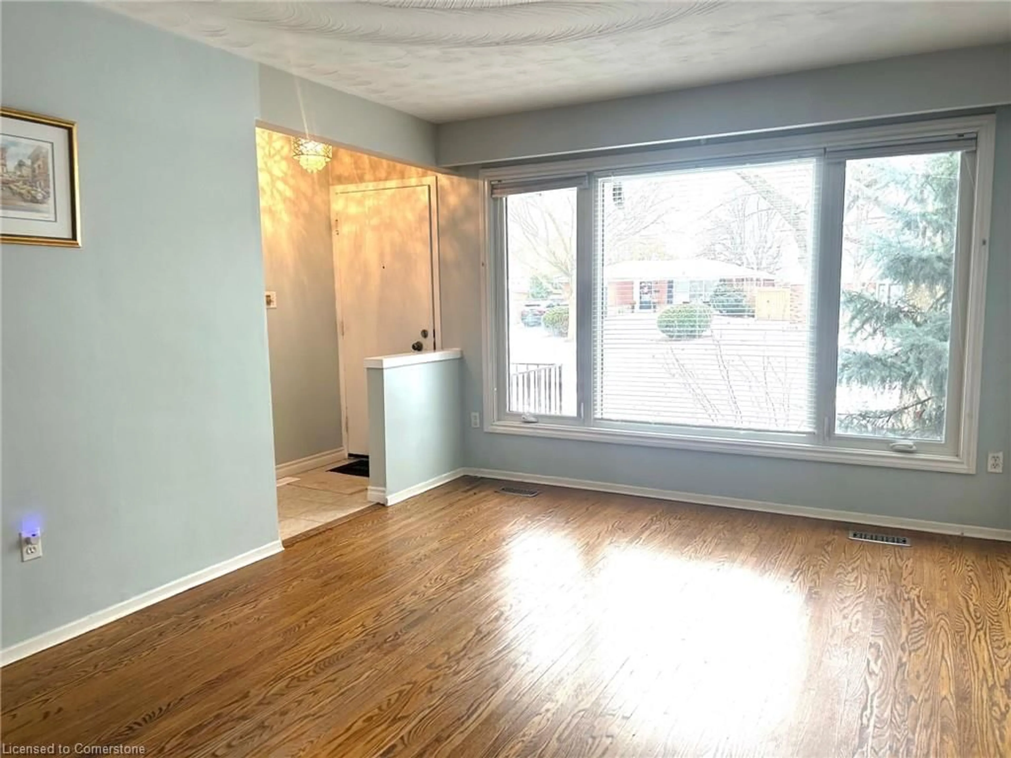 A pic of a room, wood floors for 619 Geneva Park Dr, Burlington Ontario L7N 3C2