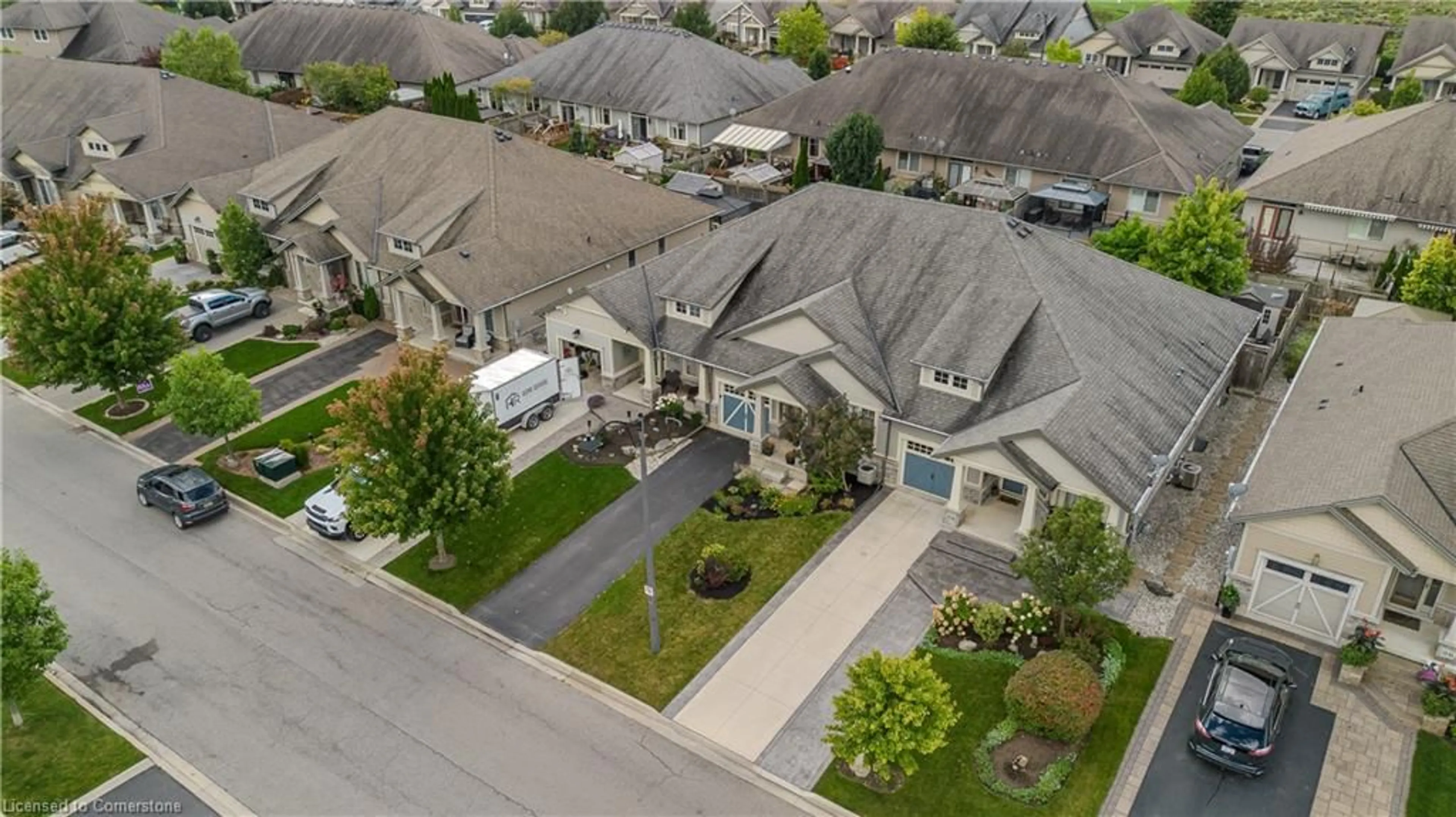 Frontside or backside of a home, the street view for 24 Manorwood Dr, Smithville Ontario L0R 2A0