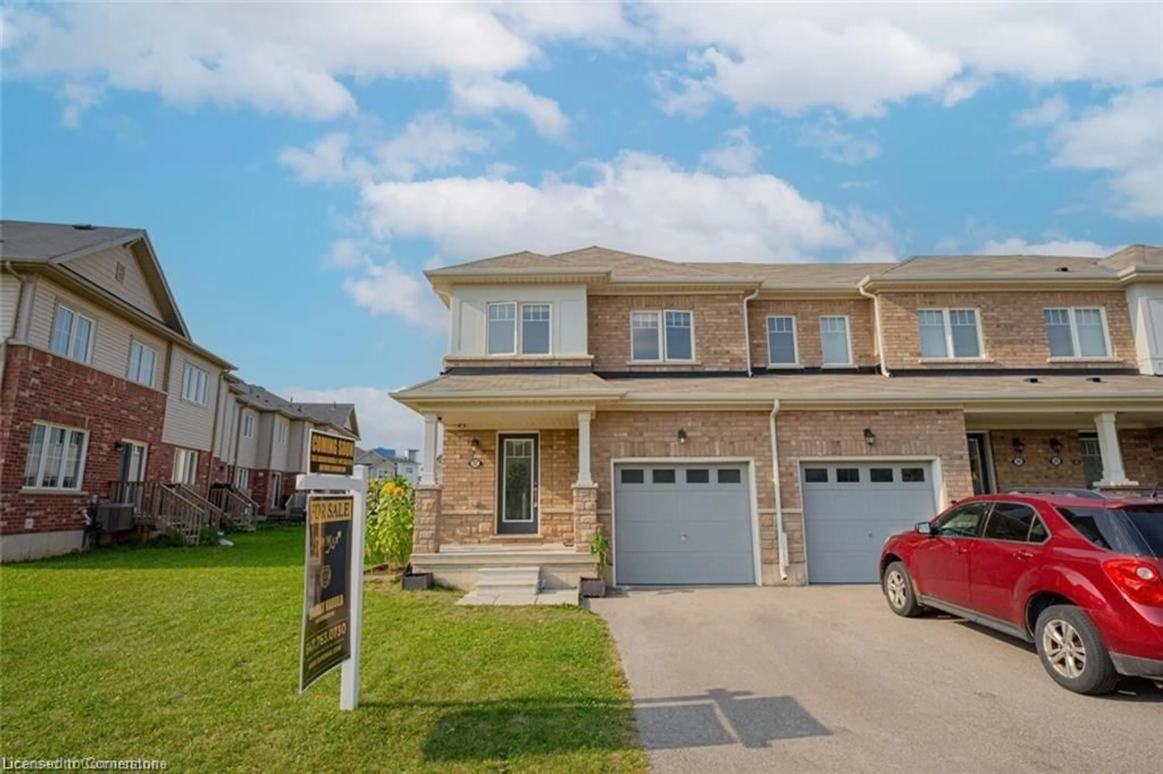 A pic from exterior of the house or condo, the street view for 32 Longboat Run West, Brantford Ontario N3T 0P3