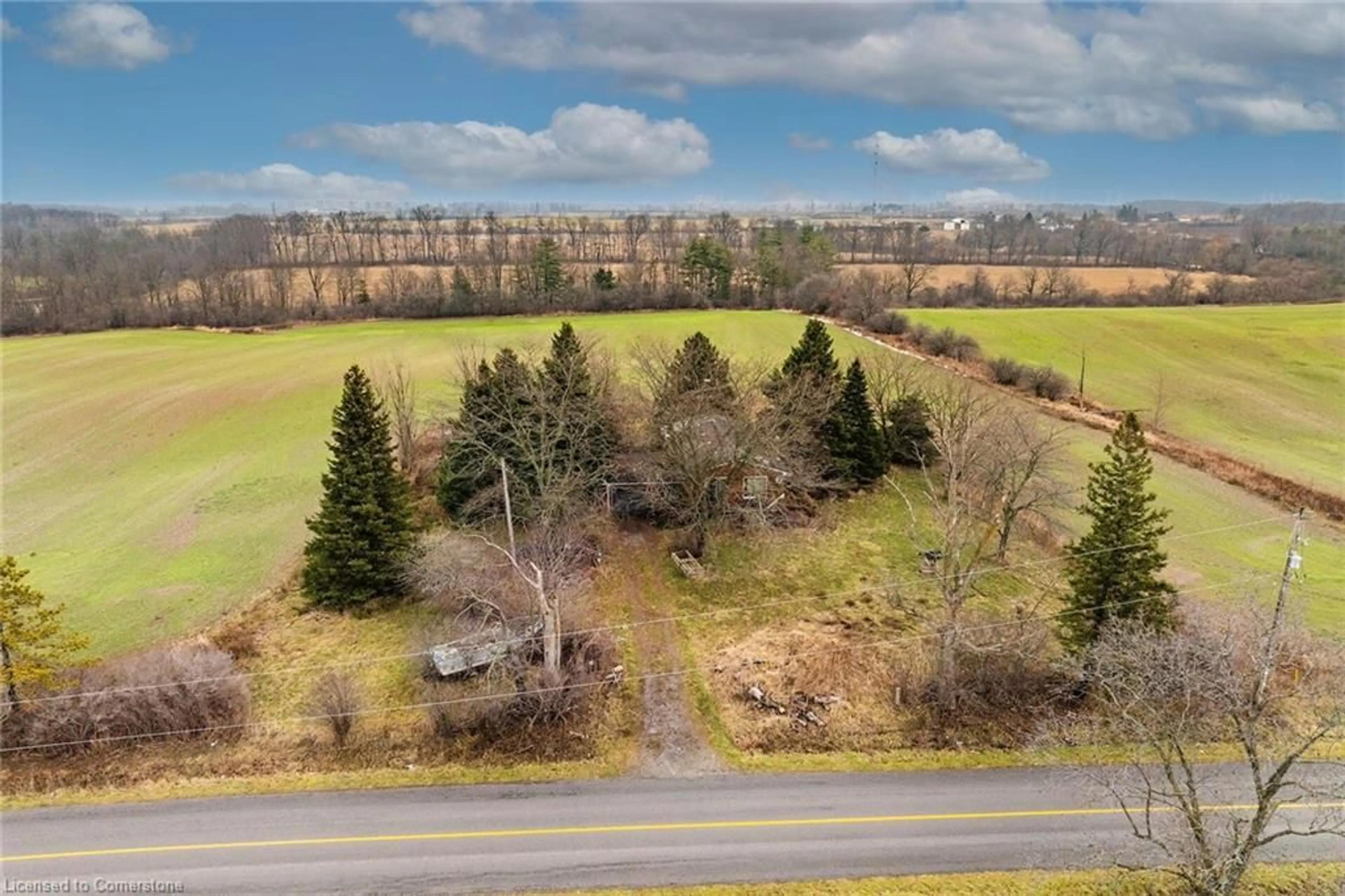 A pic from outside/outdoor area/front of a property/back of a property/a pic from drone, forest/trees view for 132 5th Line, Caledonia Ontario N3W 2A5