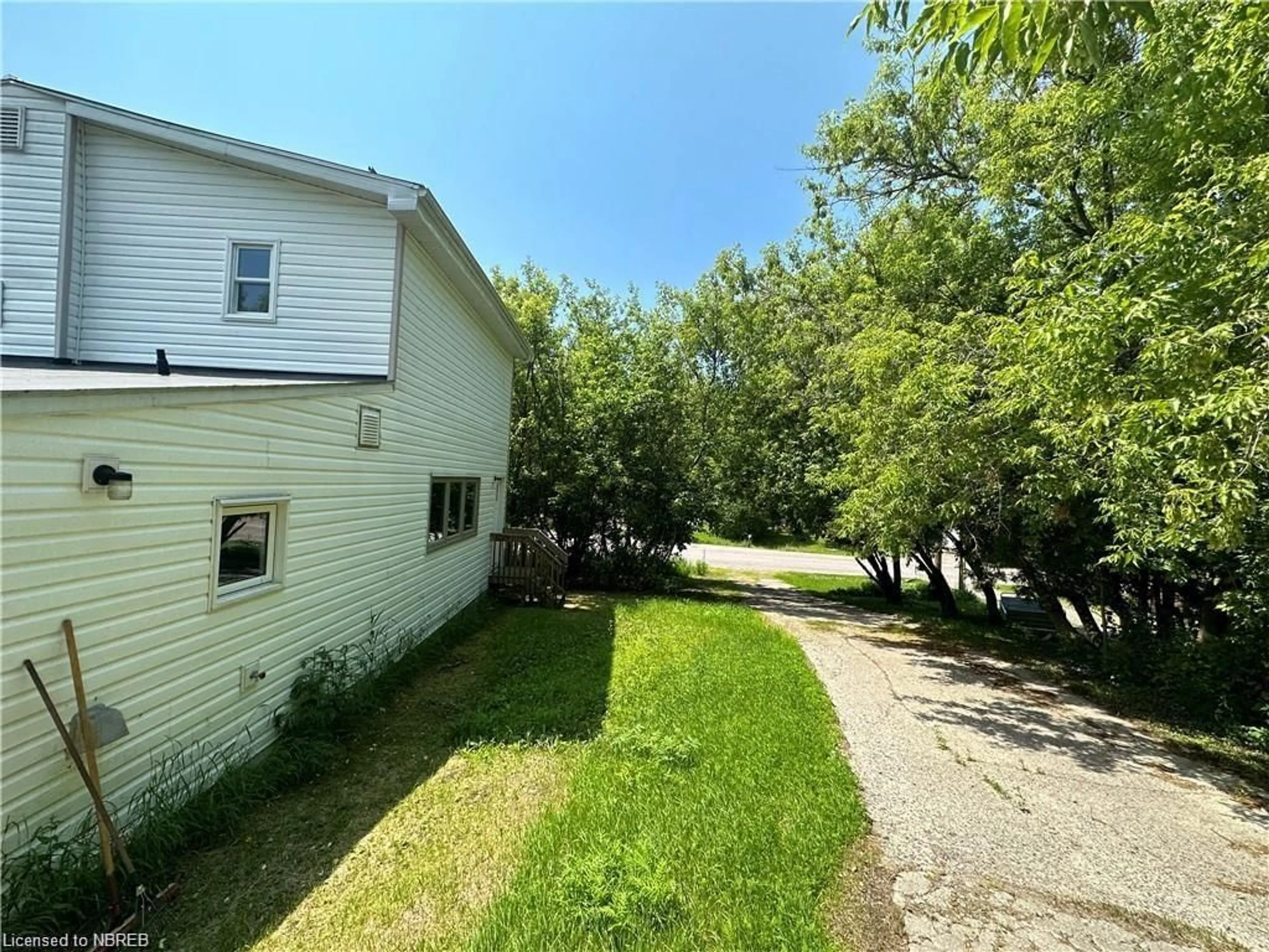 Frontside or backside of a home, the fenced backyard for 1250 Derland Rd, Corbeil Ontario P0H 1K0