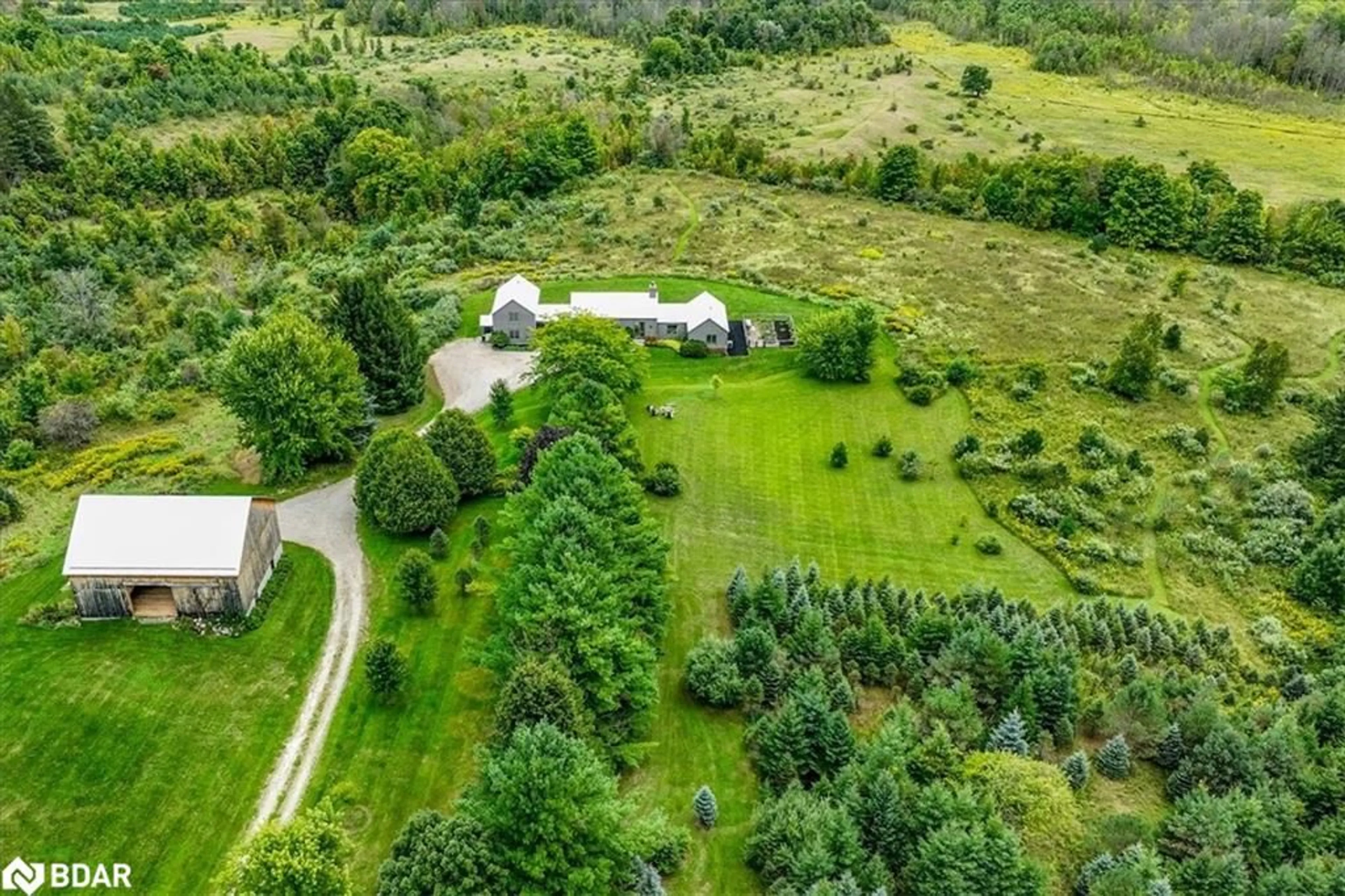 A pic from outside/outdoor area/front of a property/back of a property/a pic from drone, forest/trees view for 195851 Grey Road 7 Rd, Kimberley Ontario N0C 1G0