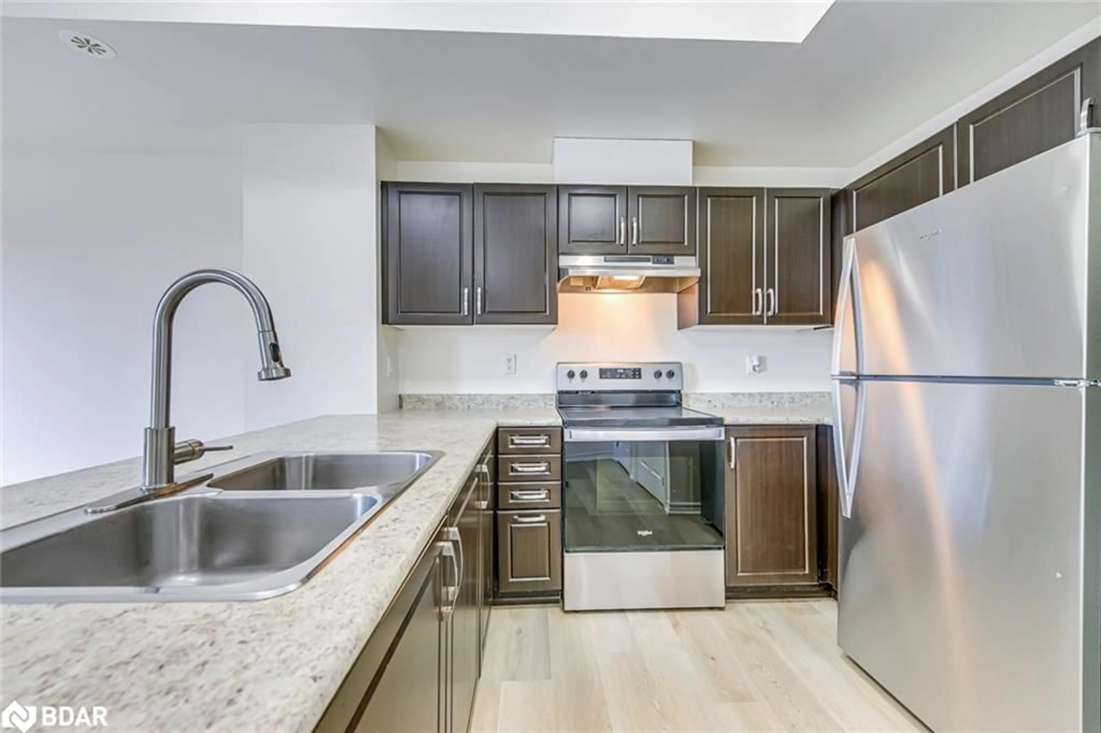 Standard kitchen, wood floors for 2420 Baronwood Dr #30-04, Oakville Ontario L6M 0J7