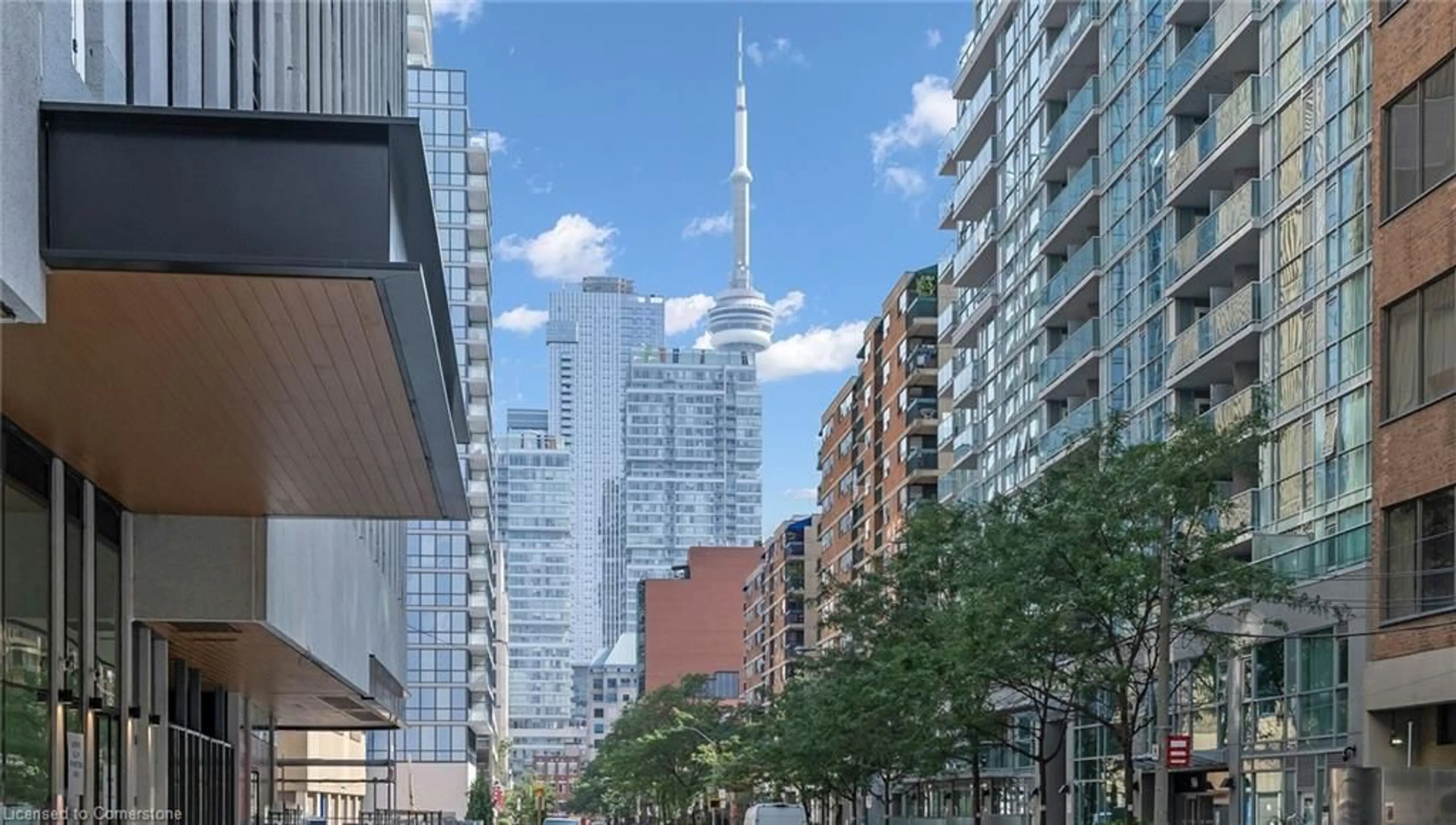 Patio, city buildings view from balcony for 121 St Patricks St #1016, Toronto Ontario M5T 0B8