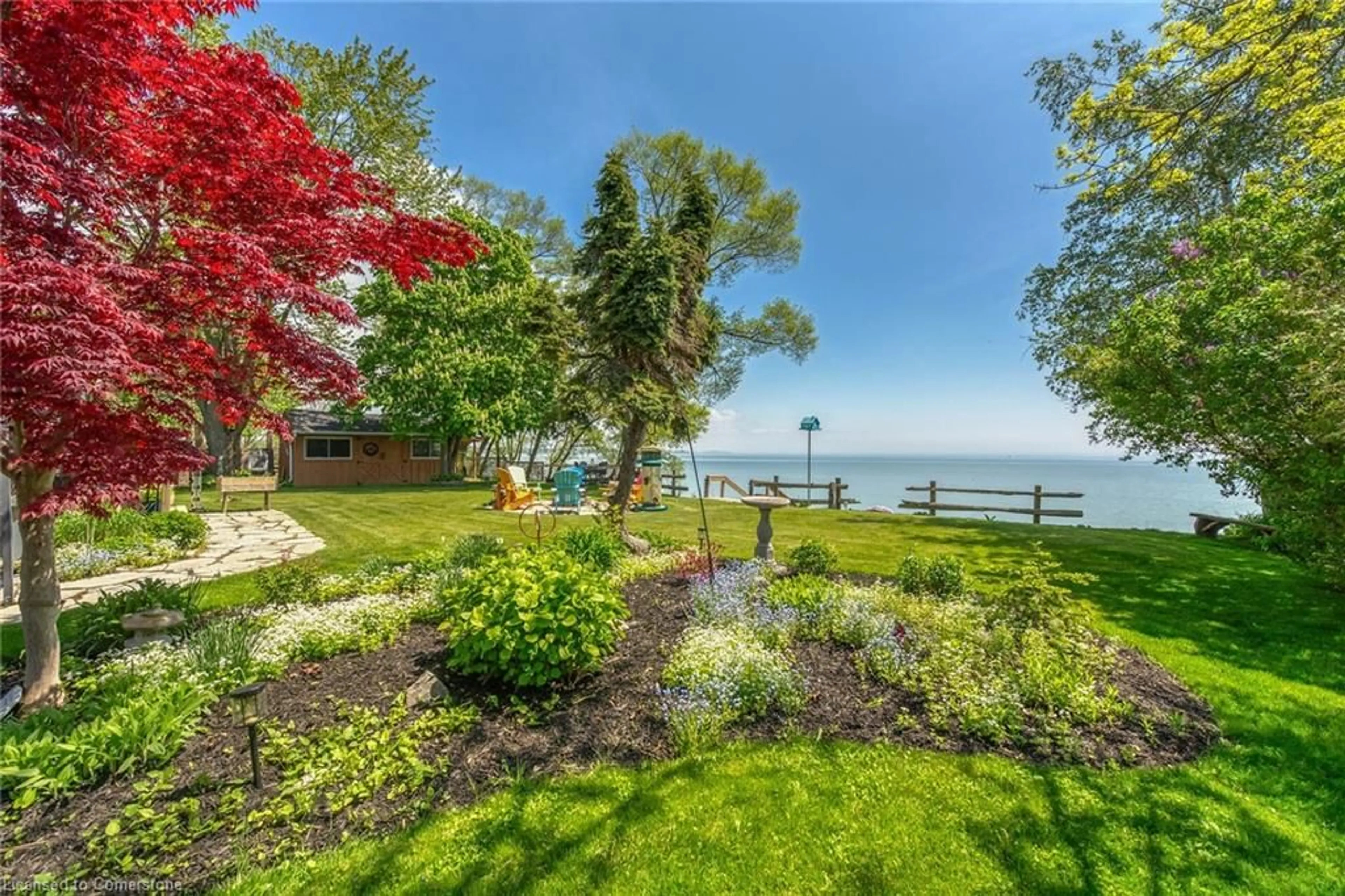 A pic from outside/outdoor area/front of a property/back of a property/a pic from drone, water/lake/river/ocean view for 864 South Coast Dr, Peacock Point Ontario N0A 1P0