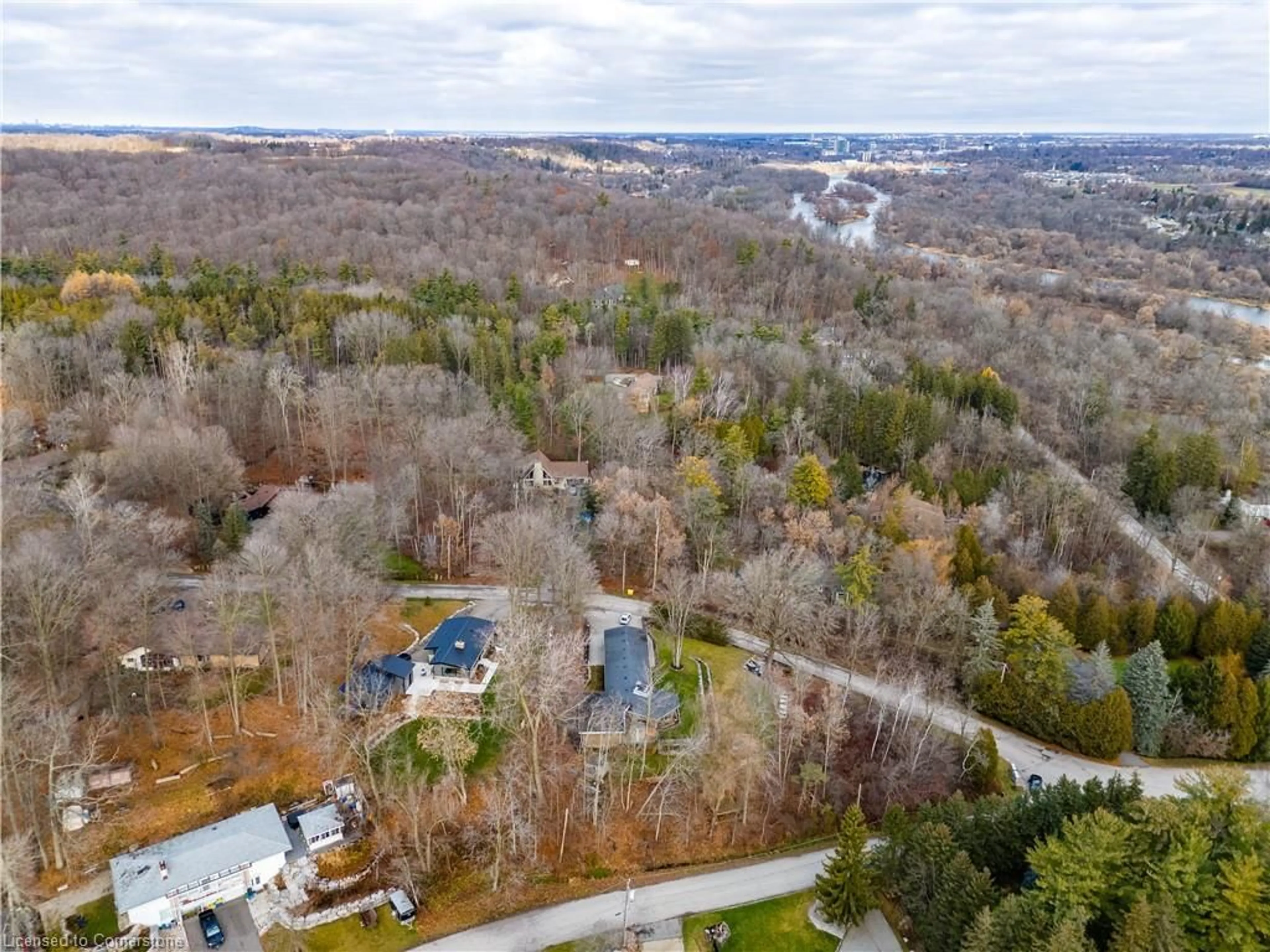 A pic from outside/outdoor area/front of a property/back of a property/a pic from drone, forest/trees view for 63 Sylvan Dr, Cambridge Ontario N1R 5S5