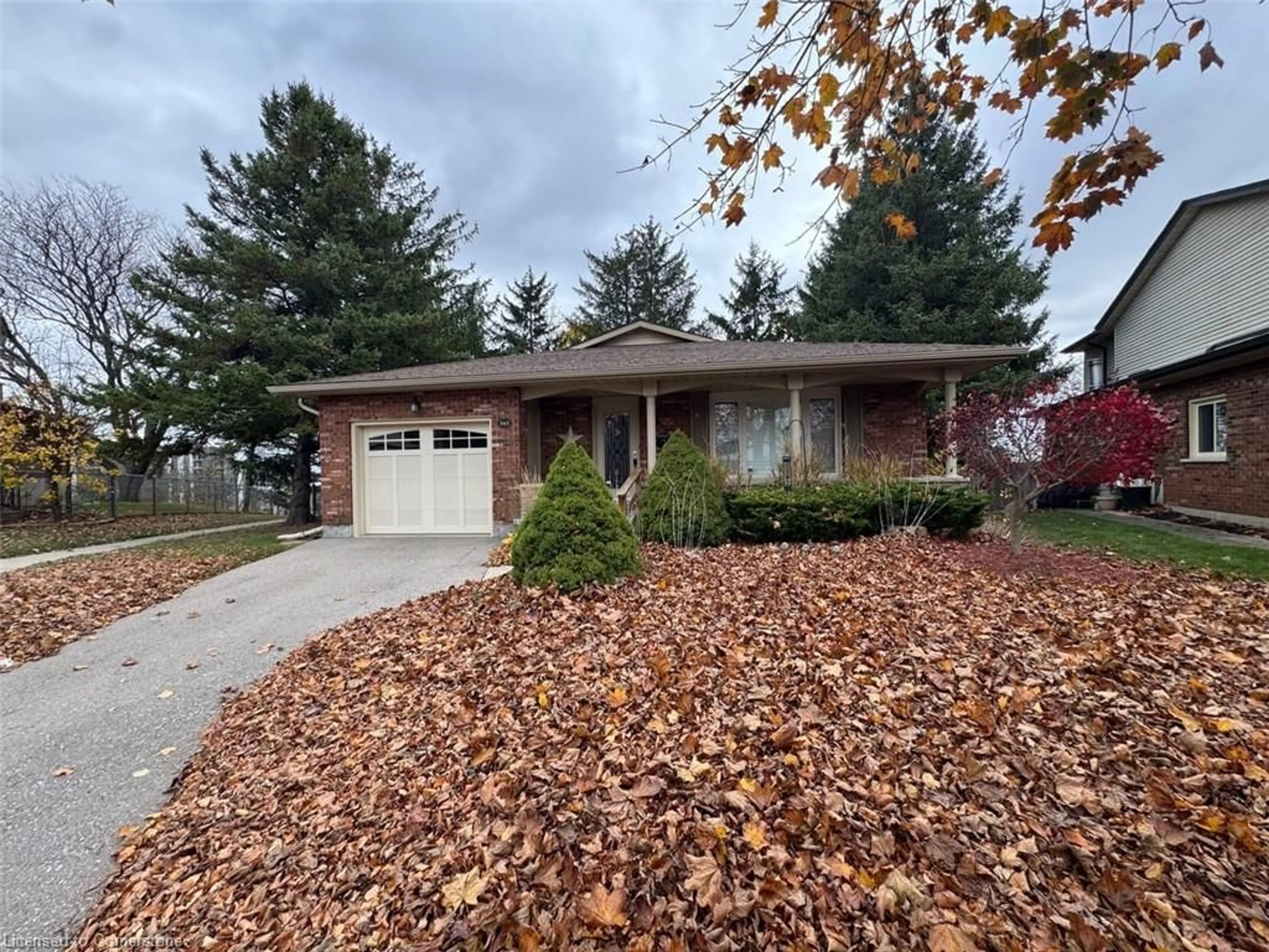 Home with brick exterior material, street for 165 Georgian Pl, Kitchener Ontario N2B 3P1