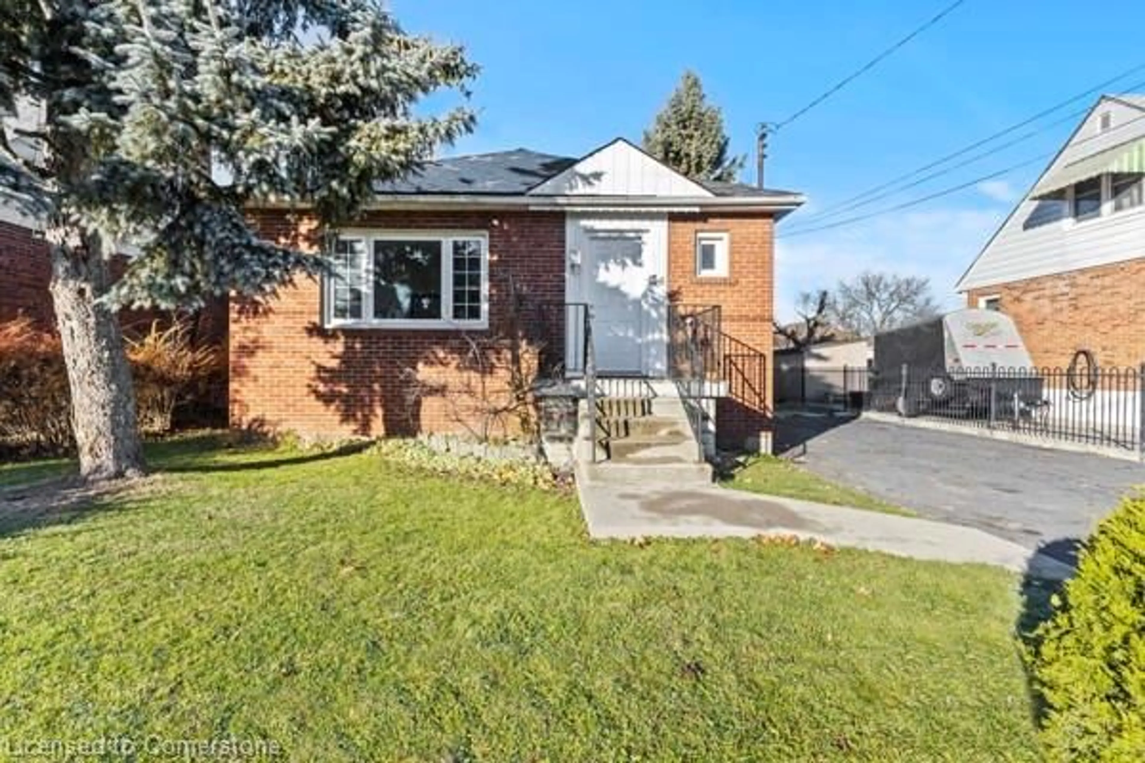 Home with brick exterior material, street for 50 West 4th St, Hamilton Ontario L9C 3M4