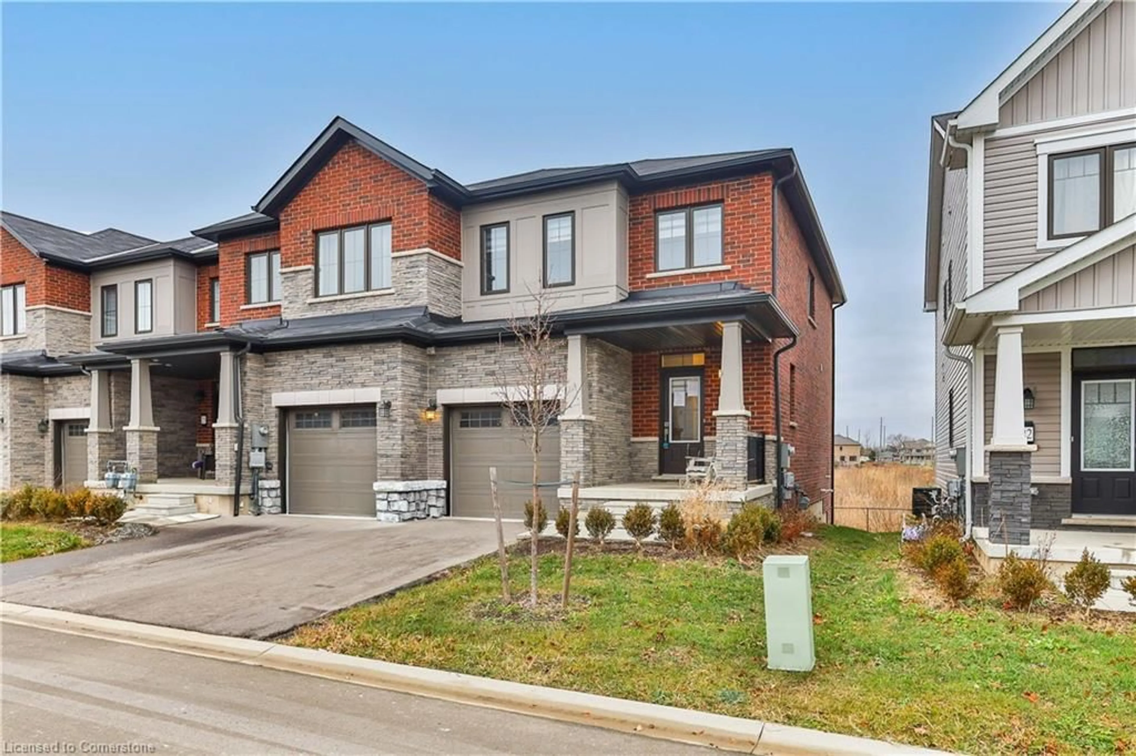 Home with brick exterior material, street for 8273 Tulip Tree Dr #23, Niagara Falls Ontario L2H 3S8